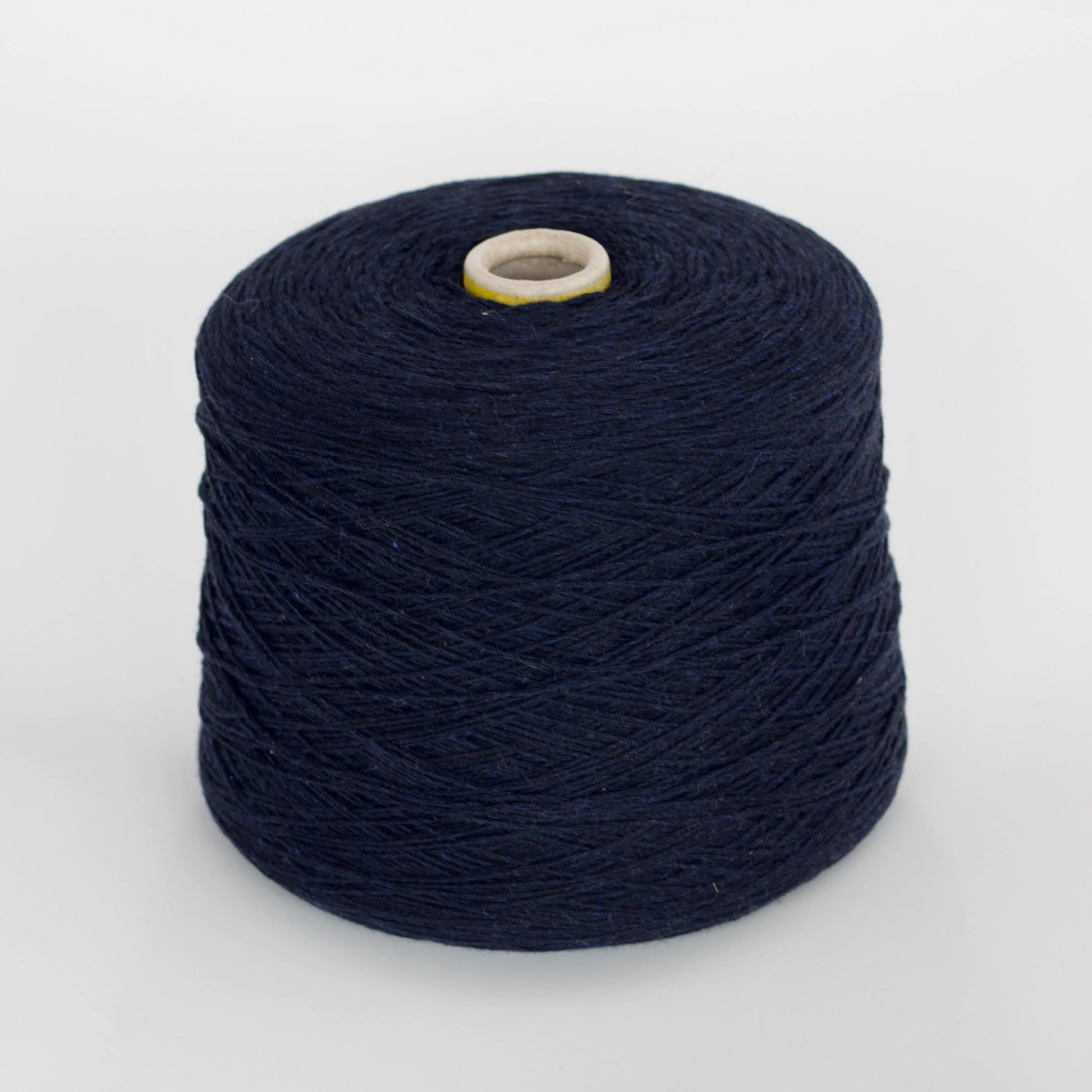 100% Cashmere yarn. Lopo Piana Coarsehair Yarn - 100 g/ 400m - Fine yarn , Hand Knitting, Machine Knitting, Yarn on Cone. Fiber: 100% Lopo Piana Coarsehair cashmere Yarn. 2/24000 in 3 threads 100%WS. Yardage per 100g: 400m per 100g / 437 yards per 3.52oz. Colour: MALZELLO (Navy blue)