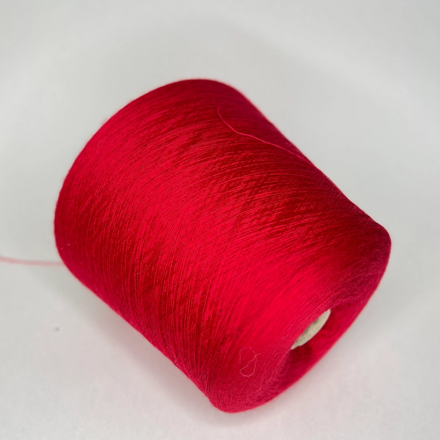 Sudwollgroup Biella Yarn. Fiber: 100% Merino yarn Victoria Plus available at our Yarn Store in Canada. Yarn Colour: red. This is a very soft pure merino yarn, It is produced in Italy by one of the best cashmere spinning mill in the world.The yarn will be perfect for weaving and knitting.