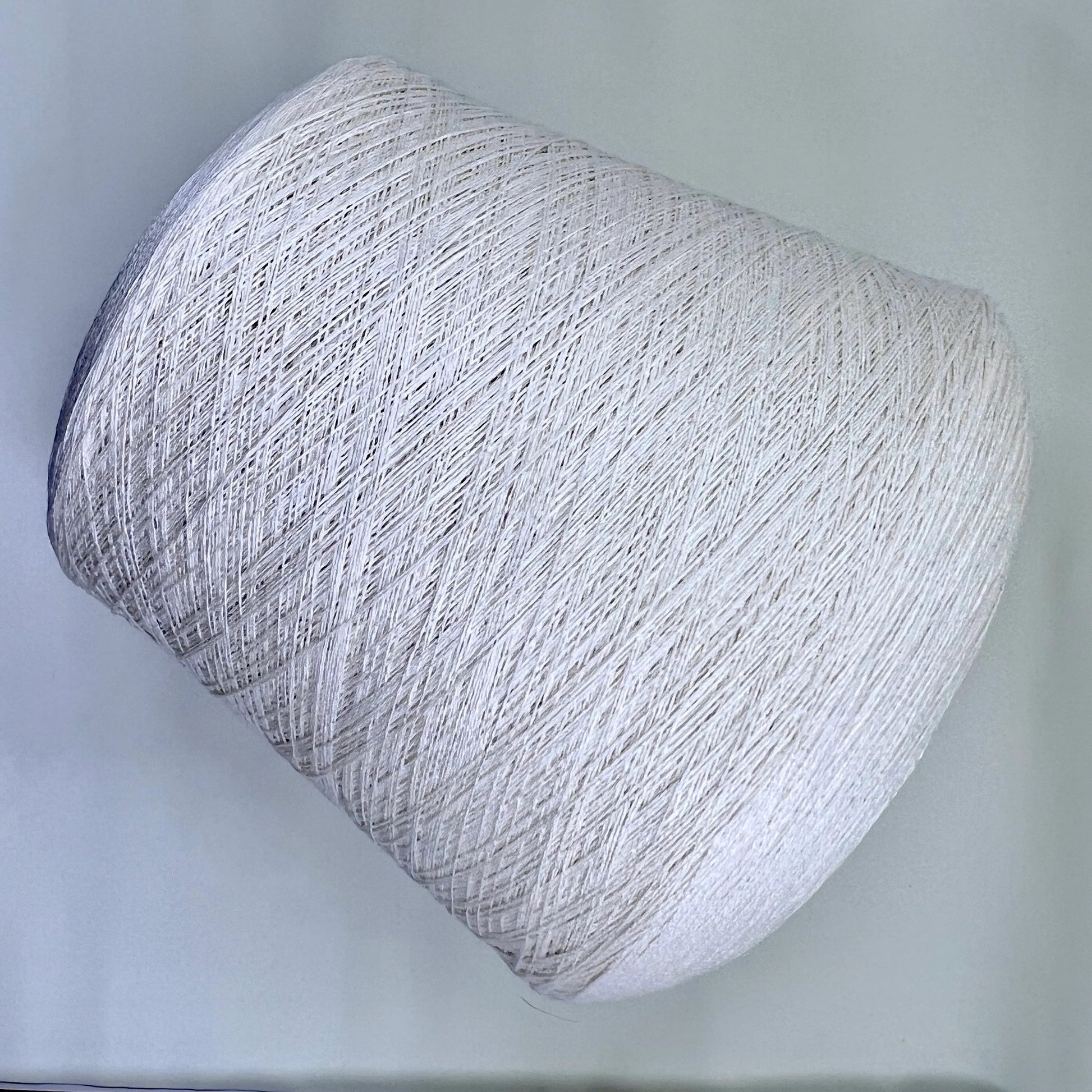 Cashmere blend Filpucci SLIGHTER. Fiber: 80% Merino wool yarn 20% Silk yarn. Yardage per 100g: 1500m per 100g / 1640 yards per 3.52oz. Yarn Colour: White (Milk). This is a very soft pure cashmere blend yarn. You can buy this beautiful yarn at our yarn store in Canada.