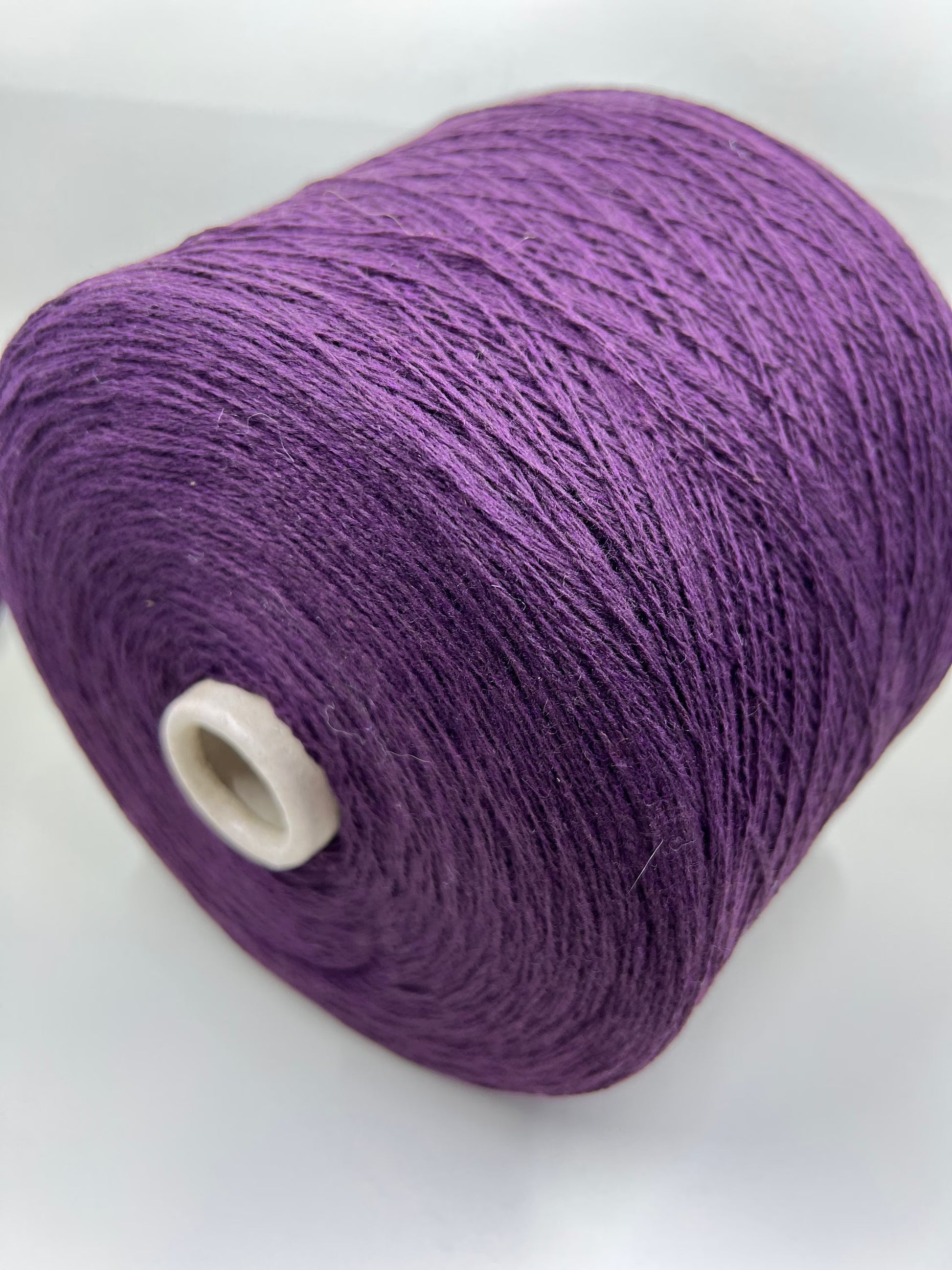 Material: 100% Merino Wool Yarn by Filpucci Industrie - Art: UPWOOL. Yarn Color: Deep Purple. This yarn boasts the exceptional quality of 100% pure Merino wool. This yarn can be purchased at our yarn store in Canada.