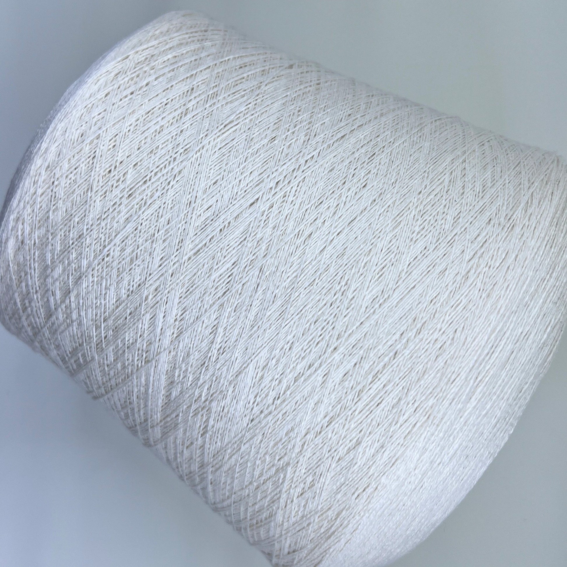 Cashmere blend Filpucci SLIGHTER. Fiber: 80% Merino wool yarn 20% Silk yarn. Yardage per 100g: 1500m per 100g / 1640 yards per 3.52oz. Yarn Colour: White (Milk). This is a very soft pure cashmere blend yarn. You can buy this beautiful yarn at our yarn store in Canada.