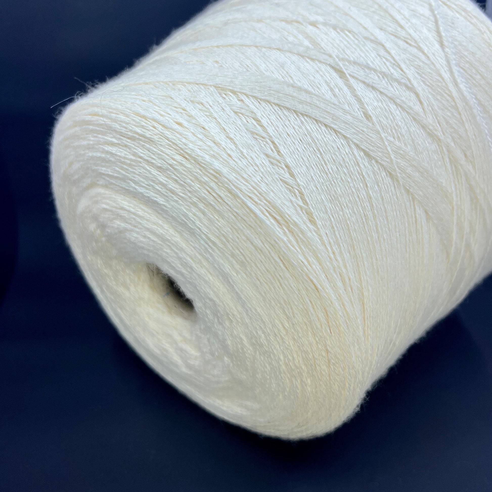 100% Merino wool yarn. Sessia TWIN - Italian fine yarn. Color yarn: White. This is a very soft merino yarn can be purchased at our yarn store in Canada. 