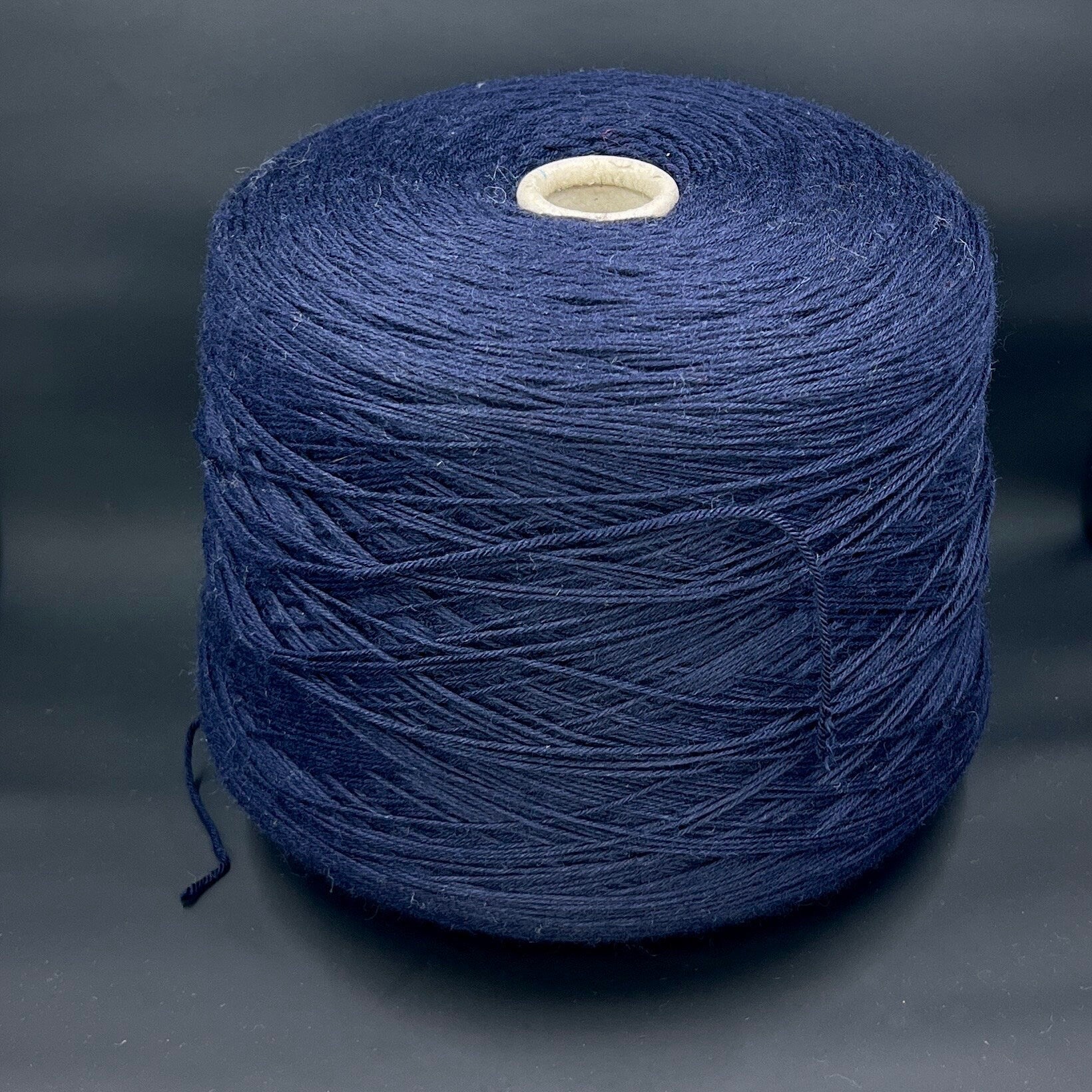 Merino wool yarn. 100% Sessia TWIN - Italian fine yarn at available at our Yarn Store in Canada, Machine Knitting. Color yarn: Navy (dark blue). This is a very soft merino wool yarn. 