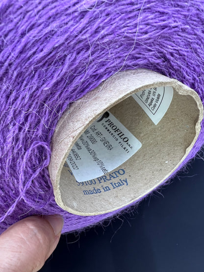 PRPFILO filati art. GINEVRA. Fiber: 20% Angora yarn, 10% Silk yarn, 30% Alpaca yarn, 40% Merino yarn. Colour: Violetta. Yarn in Cone can be purchased at our yarn store. If you need to unwind the purchased yarn into several cones, write to us.