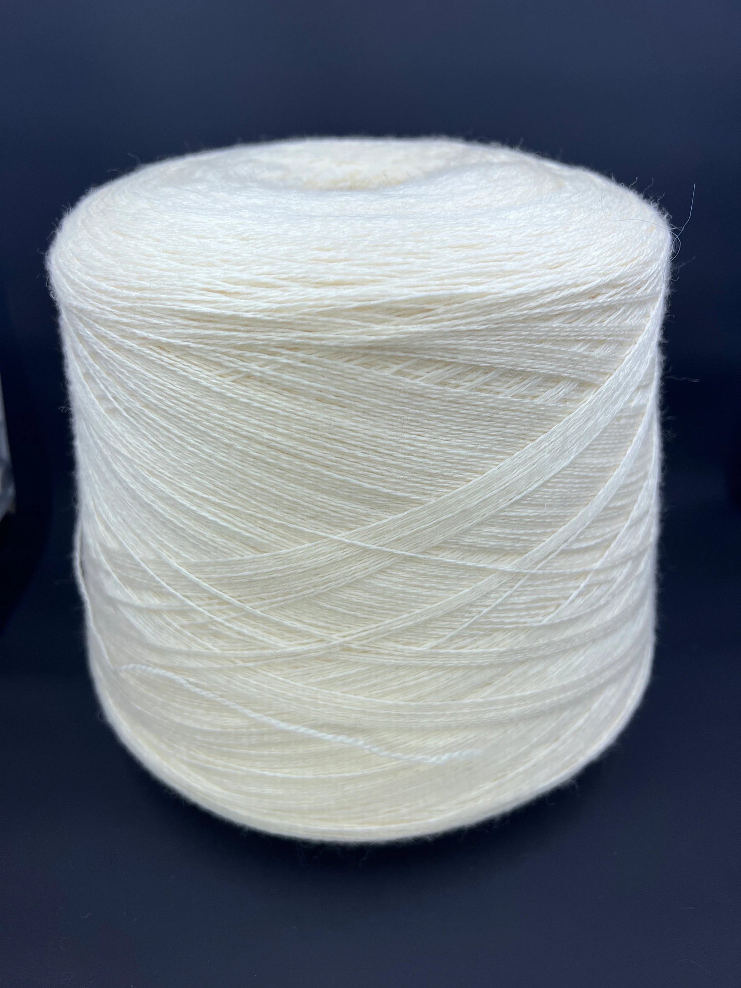 100% Merino wool yarn. Sessia TWIN - Italian fine yarn. Color yarn: White. This is a very soft merino yarn can be purchased at our yarn store in Canada. 