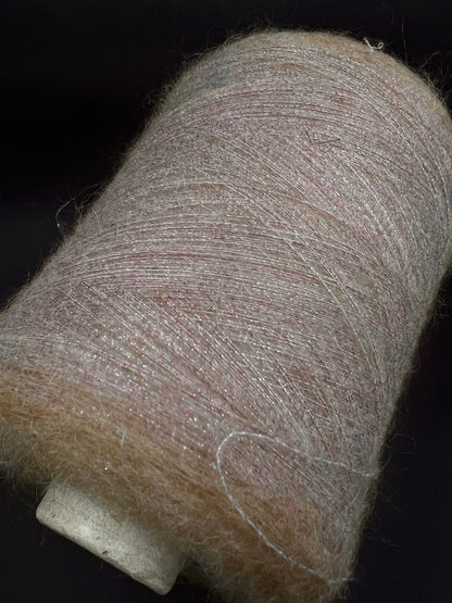 Filati Power Art: Prestige Lux. Fibre: 60% baby kid mohair yarn, 16% extrafine merino wool yarn, 26% Nylon yarn, 8% Metallized yarn. Footage: 2100 m per 100 g. Country: Italy. Color: Hazelnut Purple. Yarn on cone. All purchased yarn from 100 gr is unwound on one cone. This yarn available at our Yarn Store in Canada