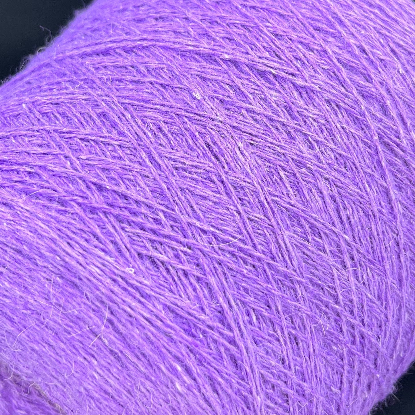 PRPFILO filati art. GINEVRA. Fiber: 20% Angora yarn, 10% Silk yarn, 30% Alpaca yarn, 40% Merino yarn. Colour: Violetta. Yarn in Cone can be purchased at our yarn store. If you need to unwind the purchased yarn into several cones, write to us.