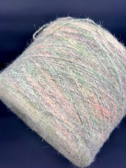 PROFILO Art: TUI. Fibre: 30% Super kid mohair yarn, 10% Merino wool yarn, 30% Nylon yarn, 30% Acrilico yarn. Yarn Color: VER BOSCO MEL. Can be used for knitting (both machine and hand). This is yarn available at our Yarn Store in Canada.