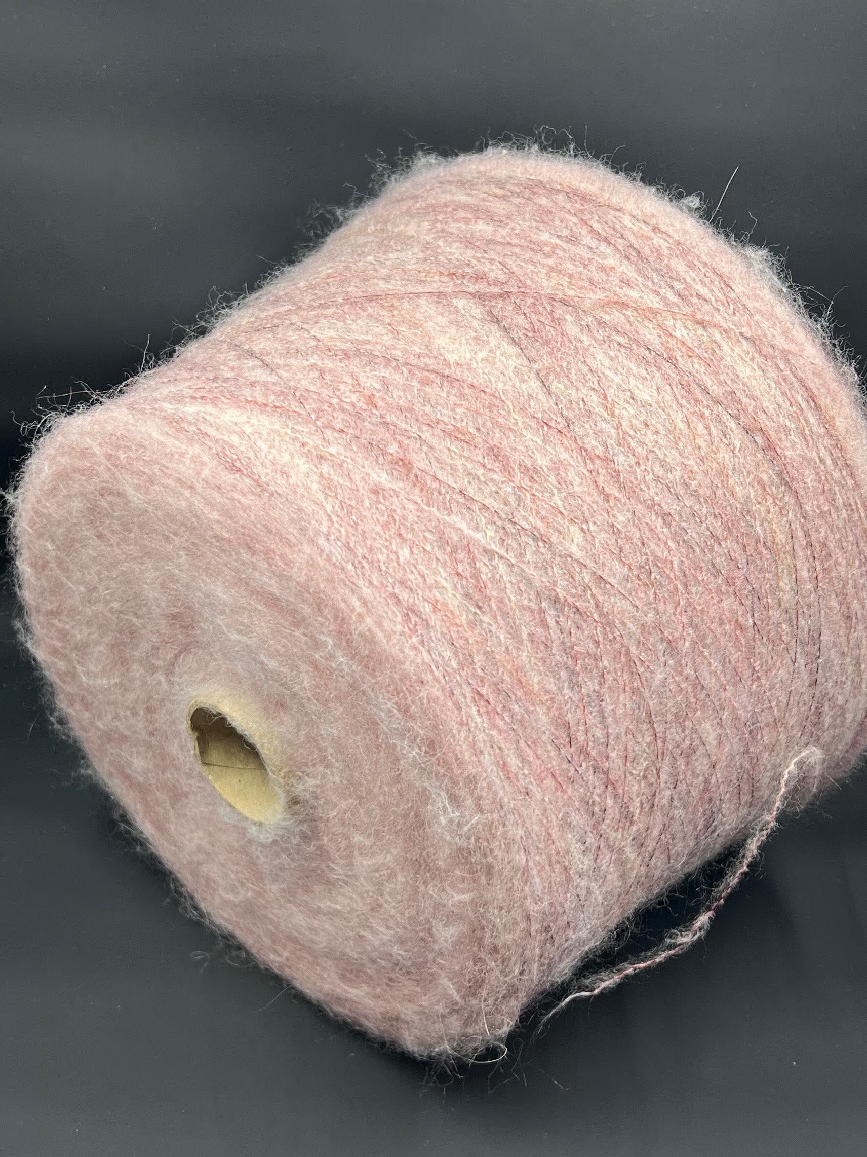 Reference: PROFILO S.N.C. Art: TUI. Fibre: 30% Super kid mohair yarn, 10% Merino wool yarn, 30% Nylon yarn, 30% Acrilico yarn. Footage: 900 m per 100 g. Yarn from Italy. Yarn Color: SIENA STA. This is yarn available in our Yarn Store in Canada.