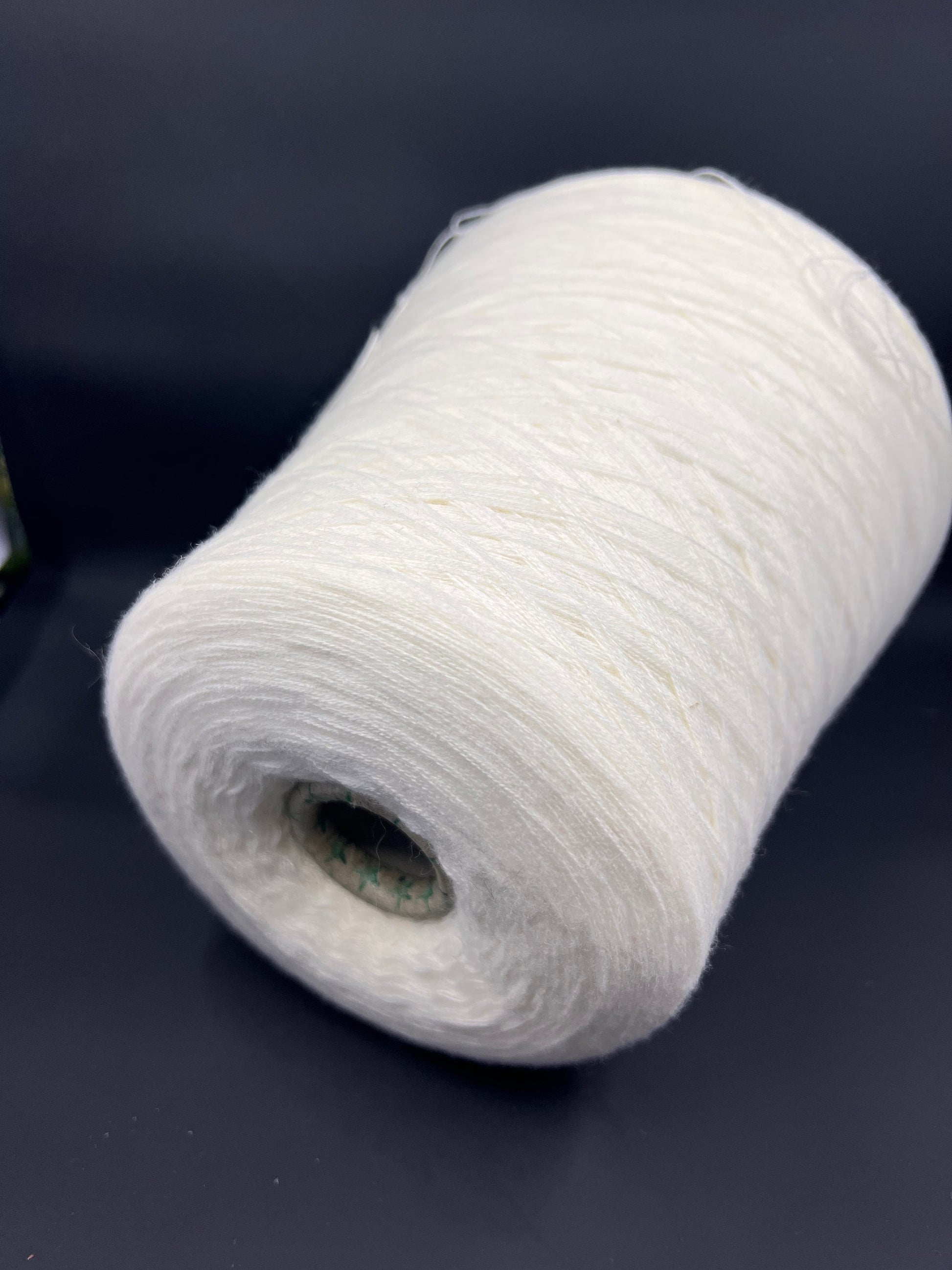 Fiber: 100% Merino wool yarn. Botto Giuseppe art: Slowool Light. Yarn Colour: White. This is a very soft pure merino wool yarn. This yarn can be purchased at our yarn store in Canada.