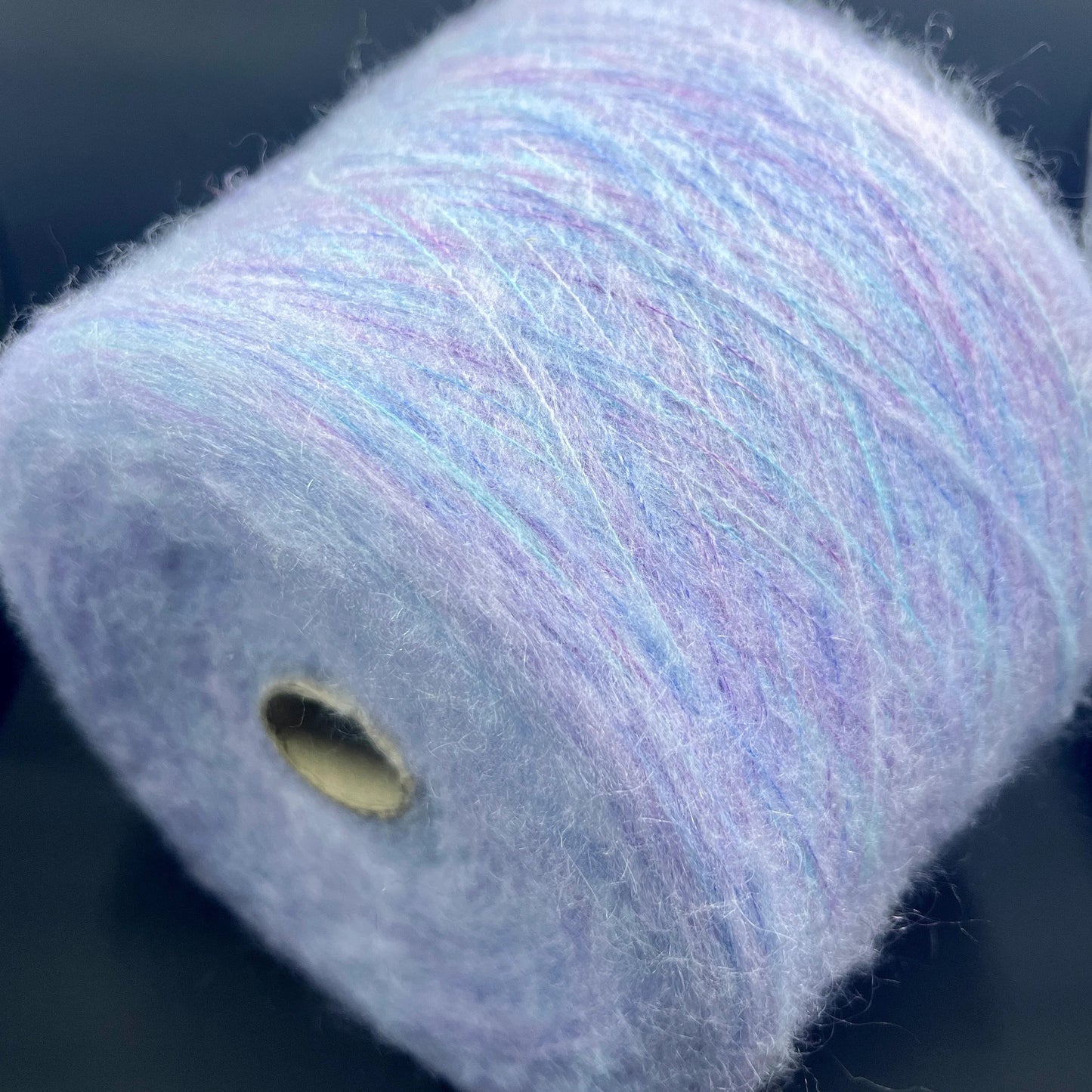 Reference: PROFILO S.N.C. TUI. Fibre: 30% Super kid mohair yarn, 10% Merino yarn, 30% Nylon, 30% Acrilico. Yarn from Country: Italy. Yarn Color: CELESTE MEL. Can be used for knitting (both machine and hand). This yarn can be purchased at our yarn store in Canada.