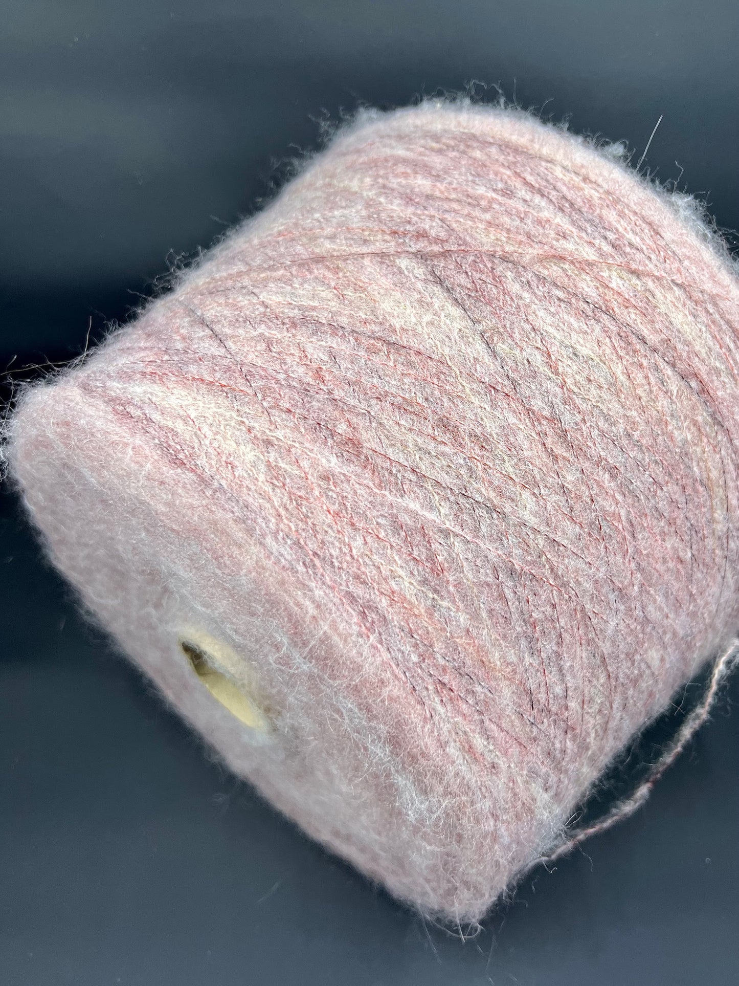 Reference: PROFILO S.N.C. Art: TUI. Fibre: 30% Super kid mohair yarn, 10% Merino wool yarn, 30% Nylon yarn, 30% Acrilico yarn. Footage: 900 m per 100 g. Yarn from Italy. Yarn Color: SIENA STA. This is yarn available in our Yarn Store in Canada.