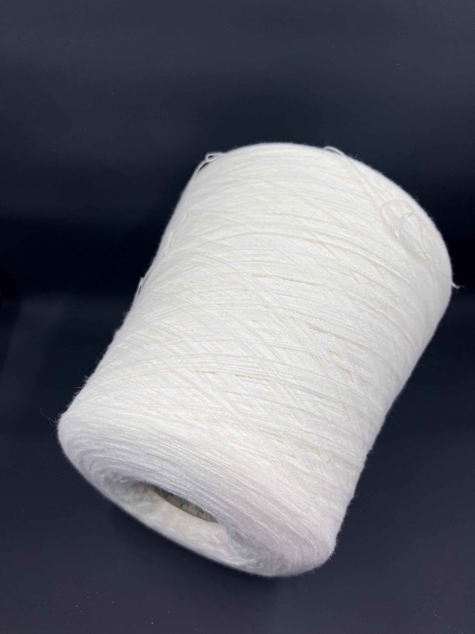 Fiber: 100% Merino wool yarn. Botto Giuseppe art: Slowool Light. Yarn Colour: White. This is a very soft pure merino wool yarn. This yarn can be purchased at our yarn store in Canada.