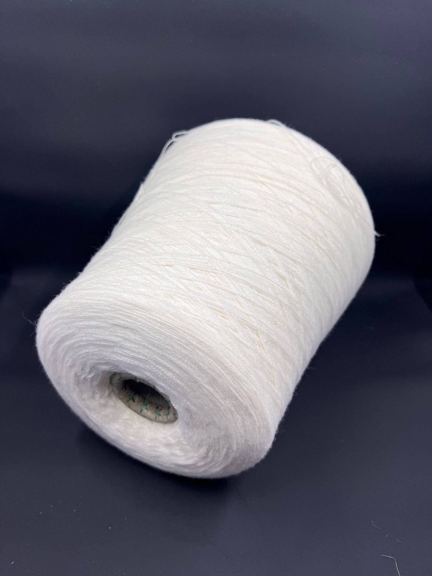 Fiber: 100% Merino wool yarn. Botto Giuseppe art: Slowool Light. Yarn Colour: White. This is a very soft pure merino wool yarn. This yarn can be purchased at our yarn store in Canada.