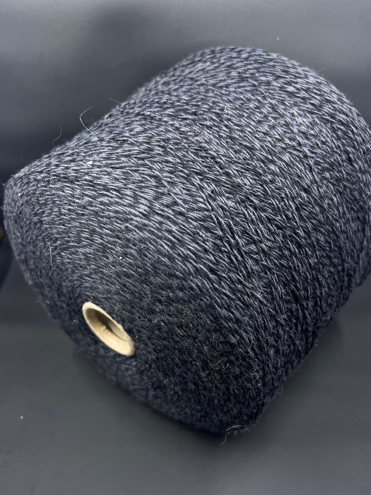 Fiber: 100% Merino wool yarn. Lanacardate SpA art Canberra. Colour yarn: DarkBlue. This is a very soft pure merino yarn can be purchased at our yarn store in Canada. It is produced in Italy by one of the best spinning mill in the world.The yarn will be perfect for Machine knitting.