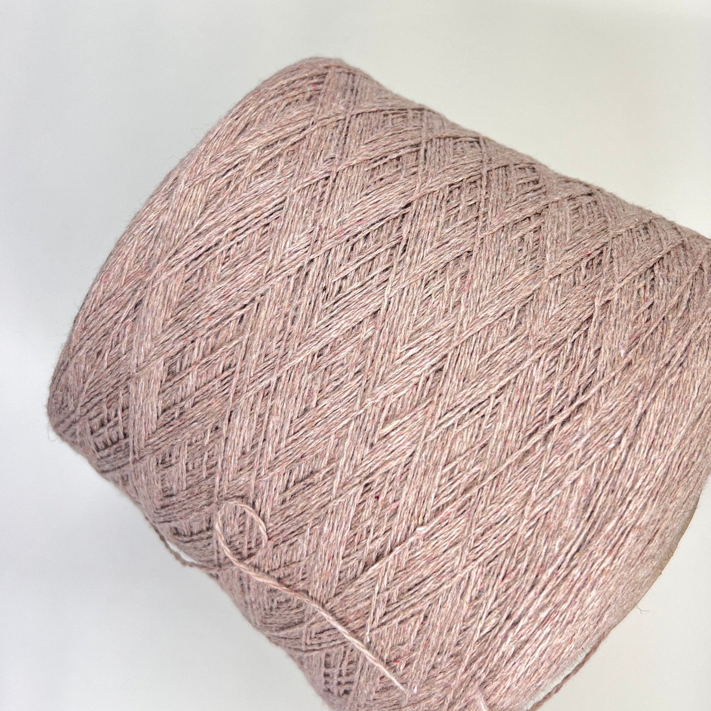 100% Cashmere Yarn. Cashmere Yarn Loro Piana. Cashmere Yarn for Hand & Machine Knitting. Fiber: 100% Cashmere Yarn. Yarn Colour: Rosato Mel.  Reference: Loro Piana, Nm 2/11. This is a very soft pure cashmere yarn.