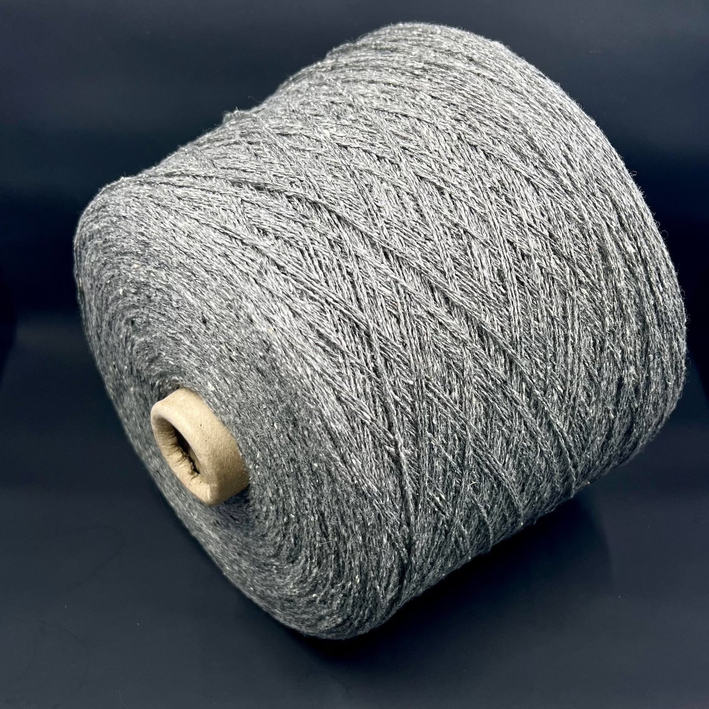 PROFILO, art. TWEED Yarn. Fibre: 70% Wool Yarn 30% Silk Yarn. Color: Grigio Medio (Medium Grey). Footage: 750m (820yard) per 100g (3.52oz) (2/15.000Nm). Country: Italy. Introducing our luxurious soft wool silk blend yarn!