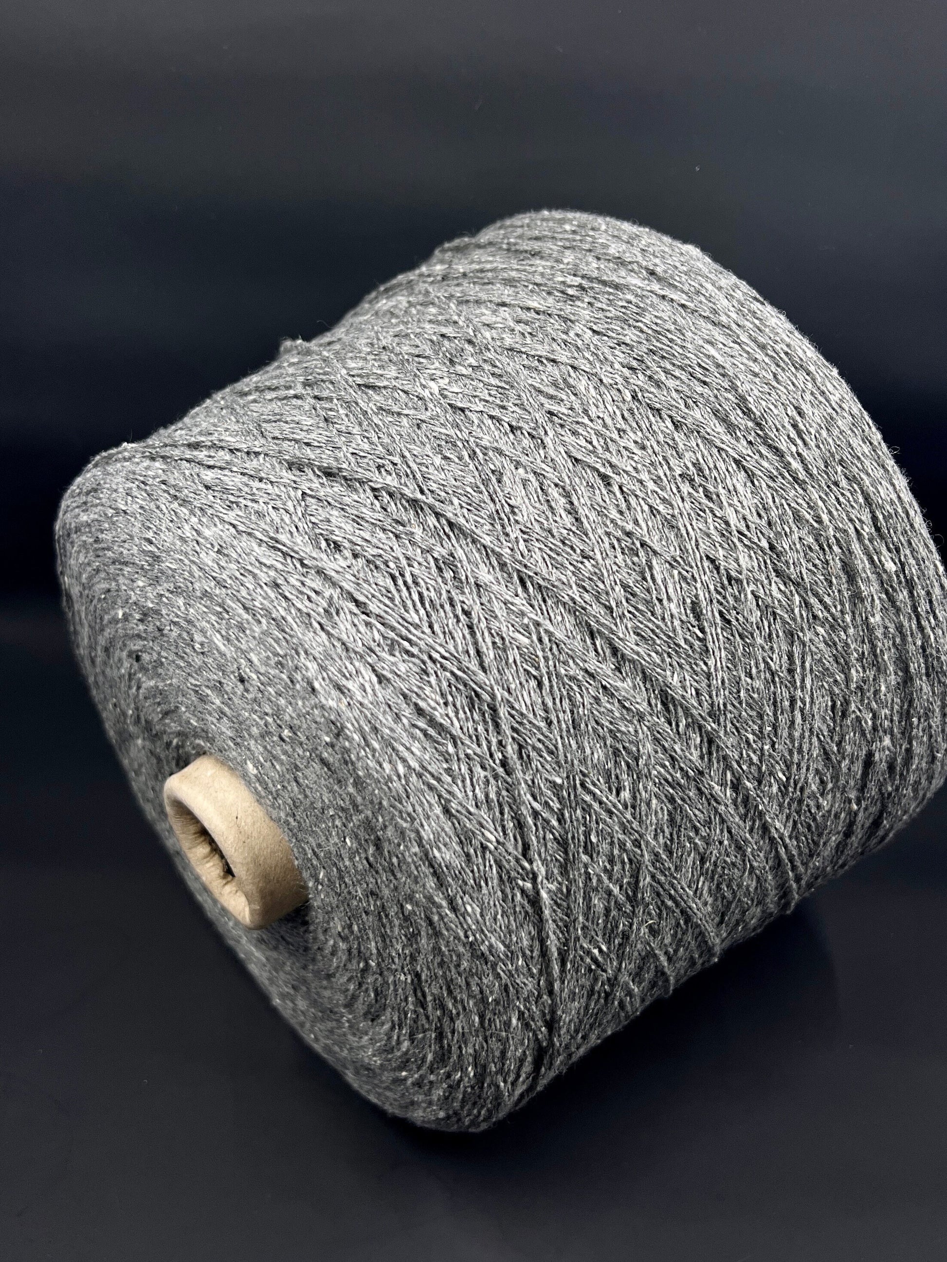 PROFILO, art. TWEED Yarn. Fibre: 70% Wool Yarn 30% Silk Yarn. Color: Grigio Medio (Medium Grey). Footage: 750m (820yard) per 100g (3.52oz) (2/15.000Nm). Country: Italy. Introducing our luxurious soft wool silk blend yarn!