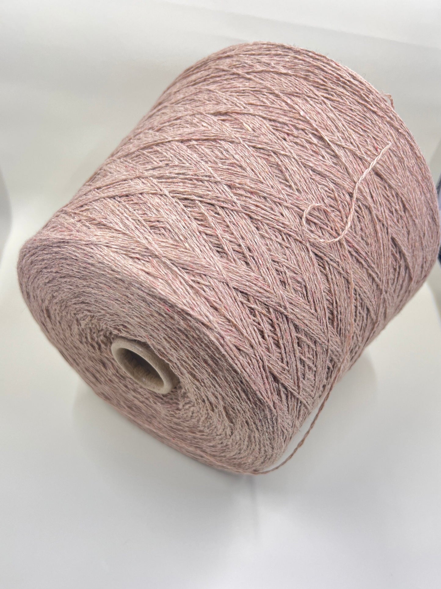 100% Cashmere Yarn. Cashmere Yarn Loro Piana. Cashmere Yarn for Hand & Machine Knitting. Fiber: 100% Cashmere Yarn. Yarn Colour: Rosato Mel.  Reference: Loro Piana, Nm 2/11. This is a very soft pure cashmere yarn.