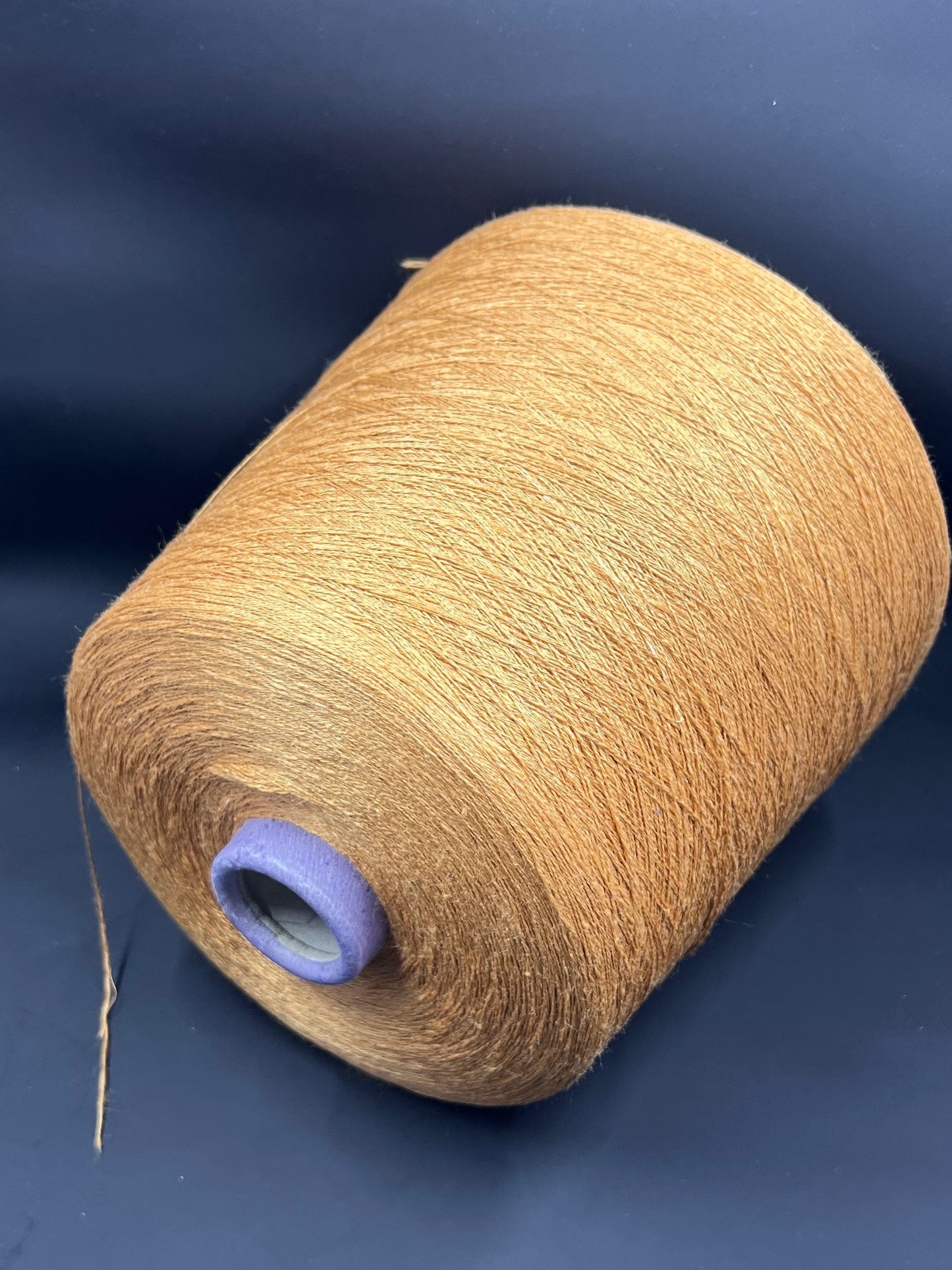 Silk Yarn Loro Piana. Silk Yarn for Hand & Machine Knitting.  Fiber: 100% Silk Yarn. Yarn Colour: Gold  Reference: Loro Piana, Nm 2/32 This is a very soft pure Silk yarn.