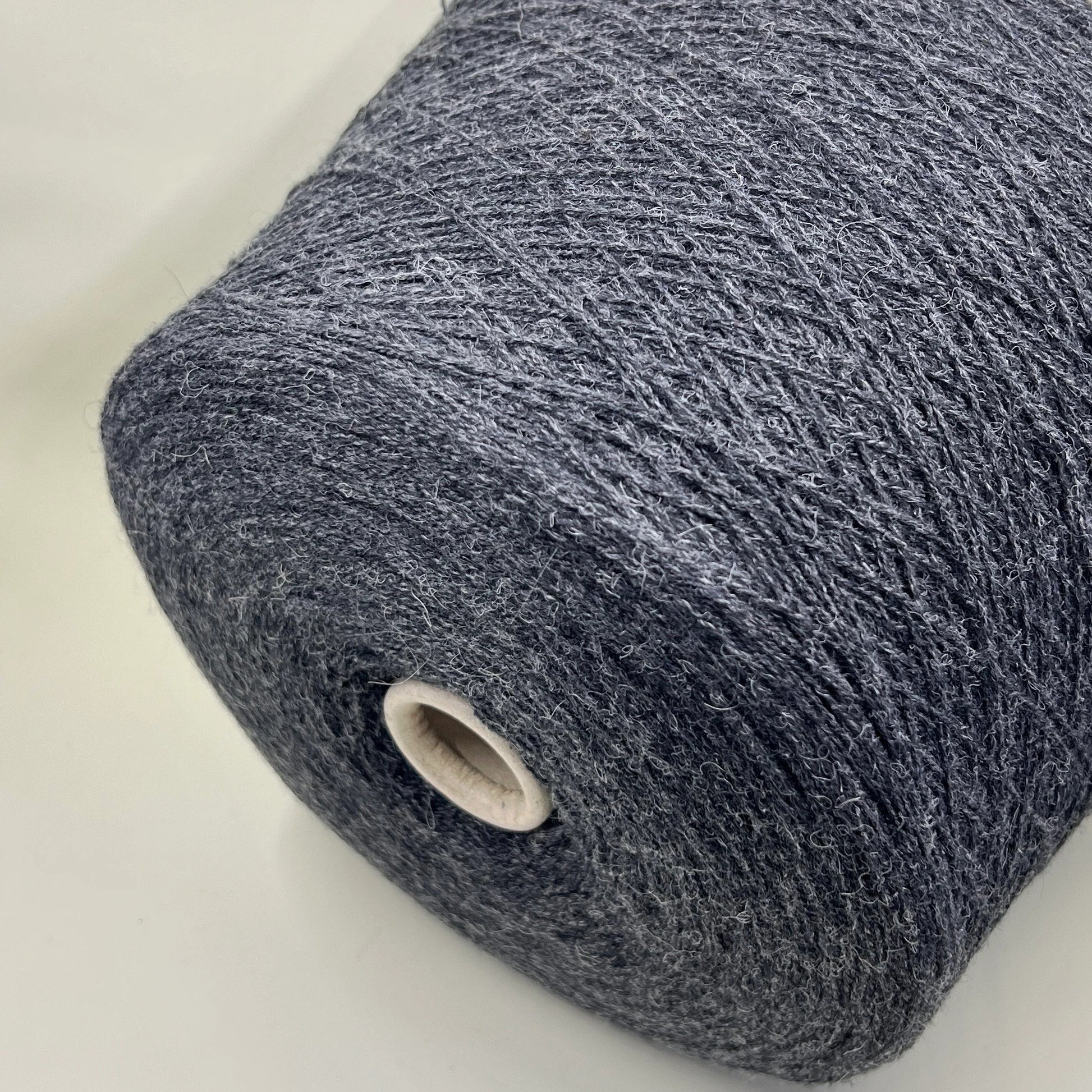 Fibre: 85% Alpaca Yarn, 15% merino wool yarn. Yarn on Cone for machine or hand knitting. Reference: Profillo TULUM Nm 2/12000 Weight: your choice Footage: 600m per 100g/ 656 yard per 3.35oz. Country: Italy. Color: Grigio mel. Can be used for knitting (both machine and hand). 