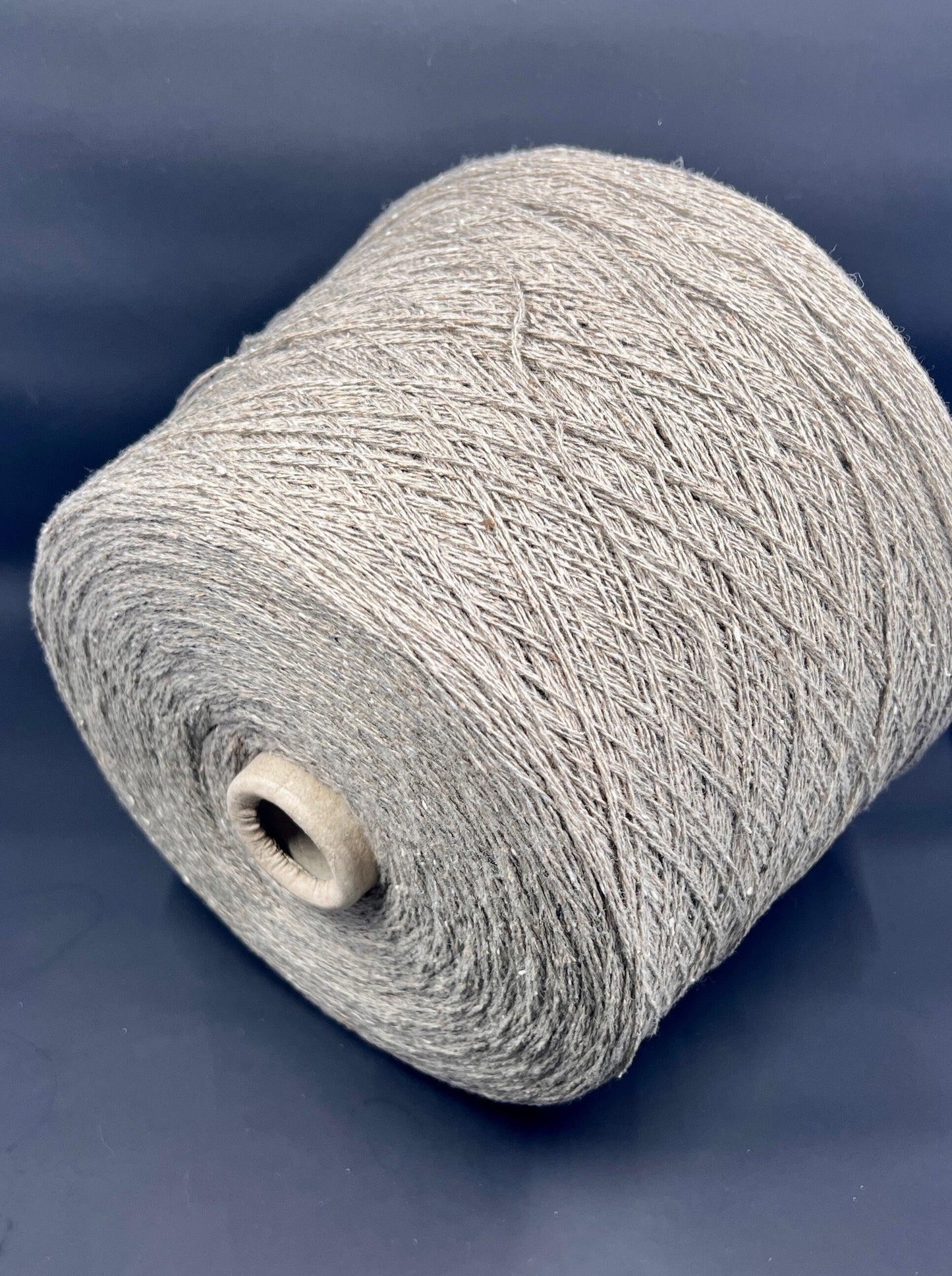 PROFILO, art. TWEED Yarn. Fibre: 70% Wool Yarn 30% Silk Yarn. Color: Corteccia. Footage: 750m (820yard) per 100g (3.52oz) (2/15.000Nm). Corteccia TWEED Yarn is a luxurious blend of wool yarn and silk Yarn.This yarn is perfect for creating cozy sweaters, scarves, shawls, and other garments that you'll love to wear.