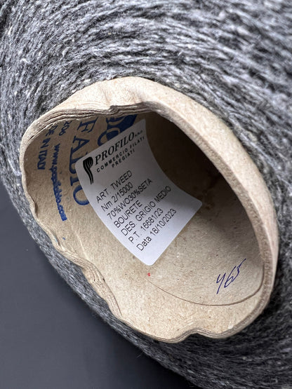 PROFILO, art. TWEED Yarn. Fibre: 70% Wool Yarn 30% Silk Yarn. Color: Grigio Medio (Medium Grey). Footage: 750m (820yard) per 100g (3.52oz) (2/15.000Nm). Country: Italy. Introducing our luxurious soft wool silk blend yarn!