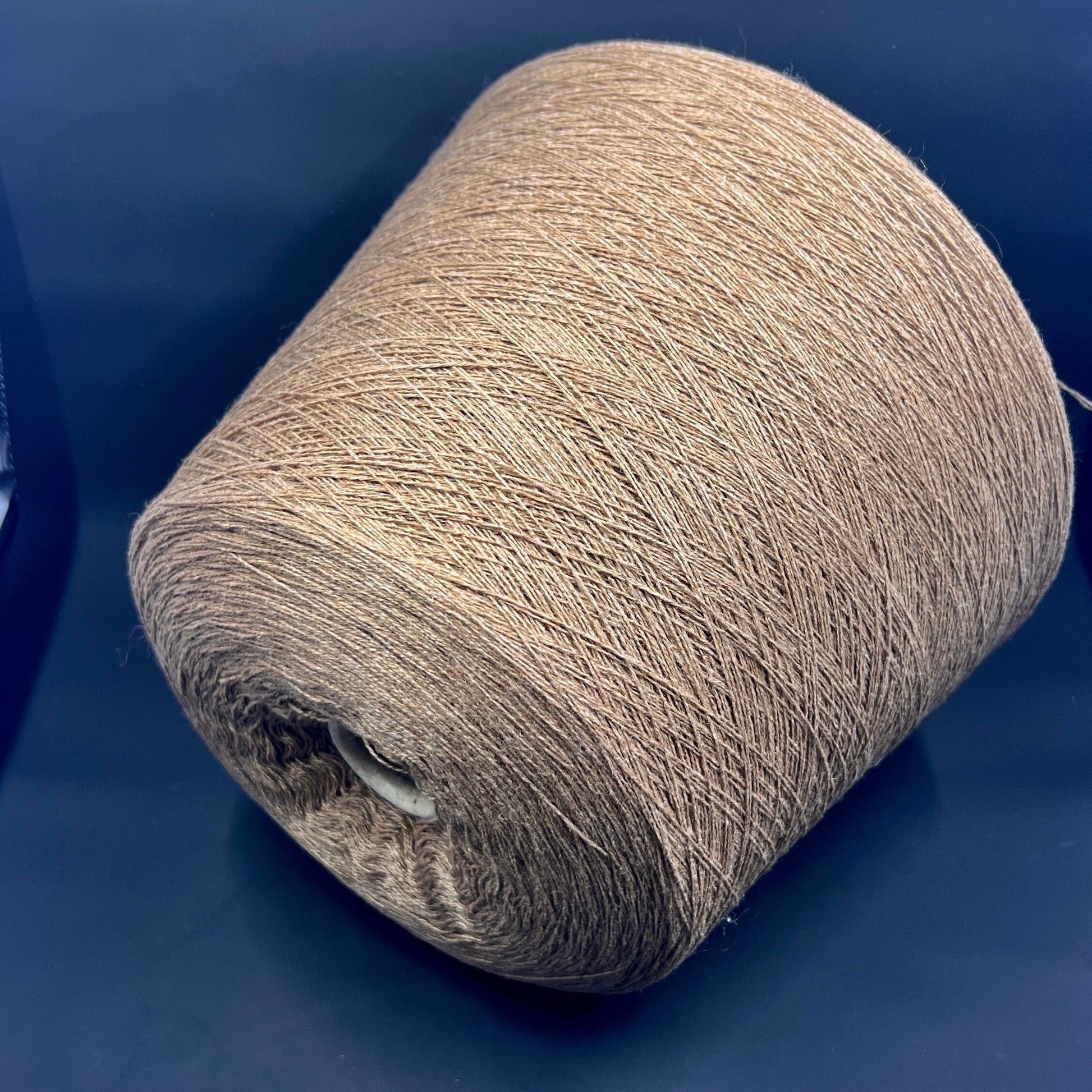 Cashmere Yarn Loro Piana. Cashmere Yarn for Hand & Machine Knitting.  Fiber: 100% Cashmere Yarn. Yarn Colour: Cammel Scuro.  This is a very soft pure cashmere yarn. Reference: Loro Piana, Nm 2/27 