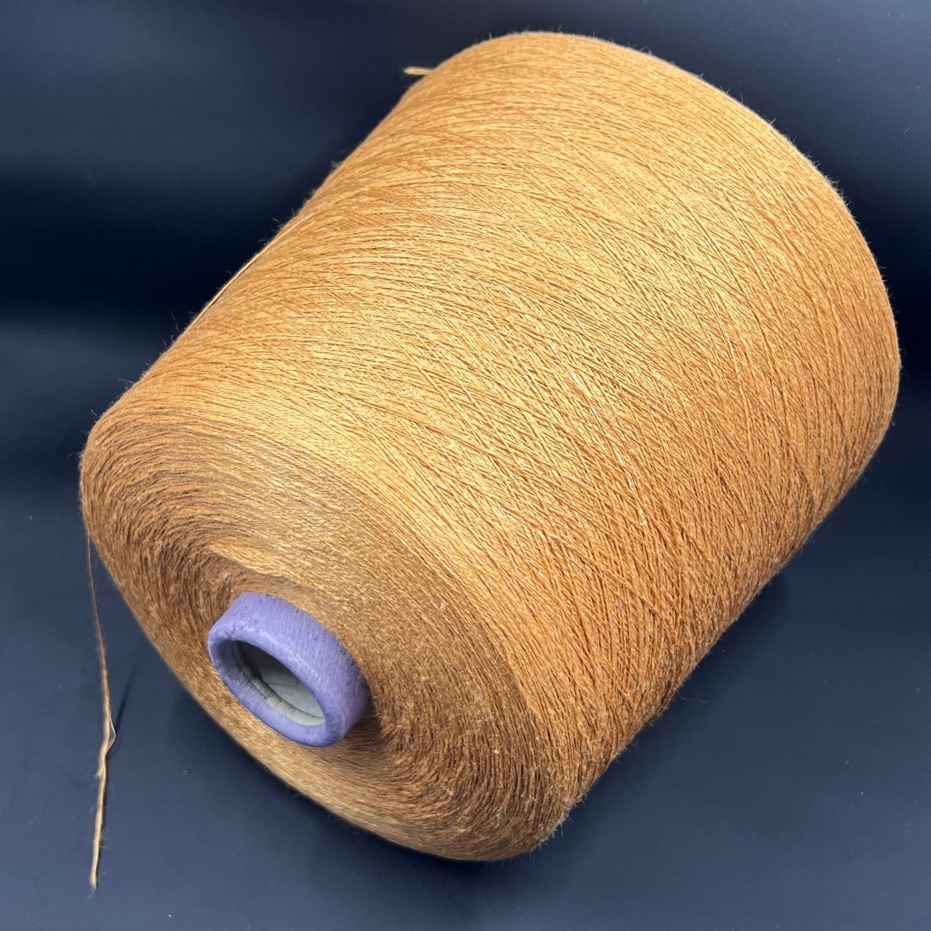 Silk Yarn Loro Piana. Silk Yarn for Hand & Machine Knitting.  Fiber: 100% Silk Yarn. Yarn Colour: Gold  Reference: Loro Piana, Nm 2/32 This is a very soft pure Silk yarn.