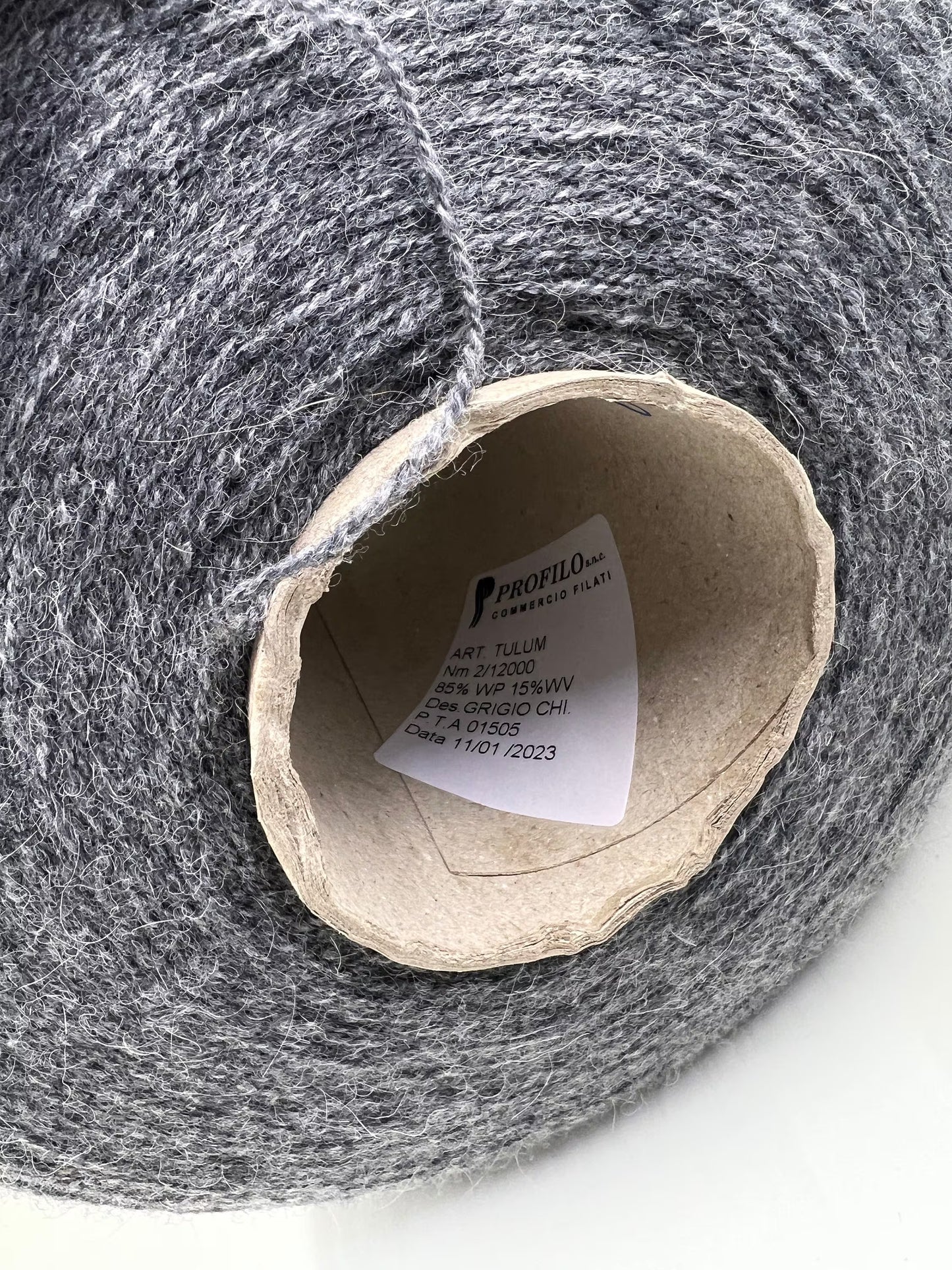 Reference: Profillo TULUM. Fibre: 85% Alpaca yarn, 15% merino wool yarn. Footage: 600m per 100g/ 656 yard per 3.35oz. Country: Italy. Yarn Color: Grigio CHI. Can be used for knitting (both machine and hand). This yarn is available in our Store in Canada.