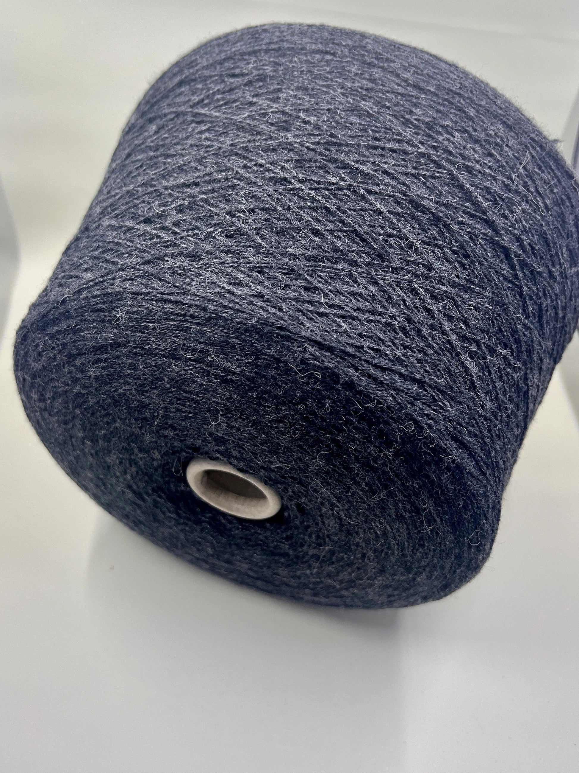 Fibre: 85% Alpaca Yarn, 15% merino wool yarn. Yarn on Cone for machine or hand knitting. Reference: Profillo TULUM Nm 2/12000 Weight: your choice Footage: 600m per 100g/ 656 yard per 3.35oz. Country: Italy. Color: Grigio mel. Can be used for knitting (both machine and hand). 