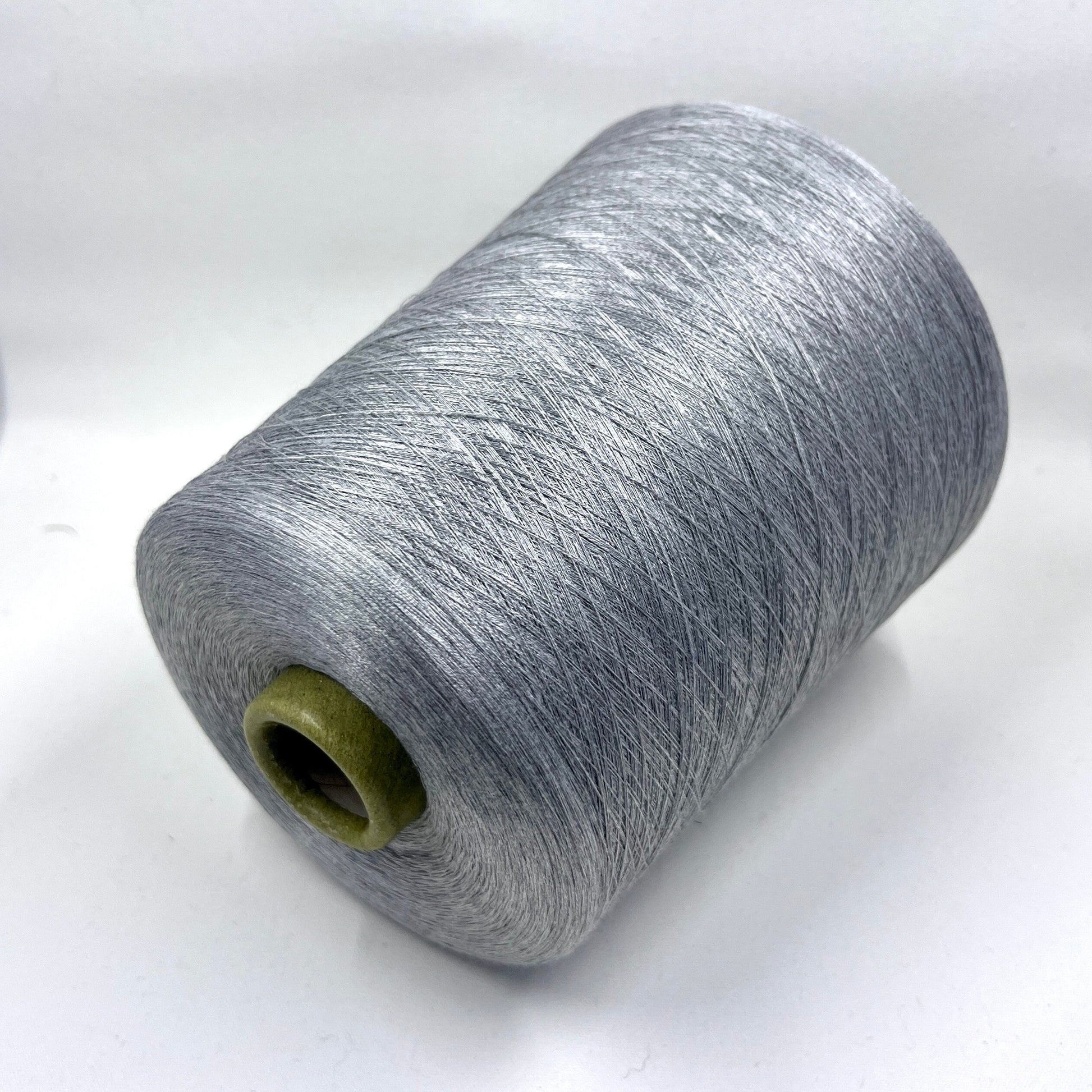 100% Silk Yarn. Italian Silk Yarn for Hand & Machine Knitting.  Reference: Botto Giuseppe, Schappe NM 2/120 Fibre: 100% Silk Yarn. Yarn Color: Grigio (Steel Gray).  The yarn will be perfect for weaving and knitting.