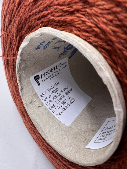 Wool Yarn & Cashmere Yarn by PROFILLO. Cashmere Yarn & wool Yarn for Hand & Machine Knitting.  Fiber: 50% Wool Yarn & Cashmere Yarn 50%   Yarn Colour: Rust, Mandarino, Avio, Blue Reference: PROFILLO, Nm 2/15 This is a very soft pure Cashmere blend yarn by PROFILLO.