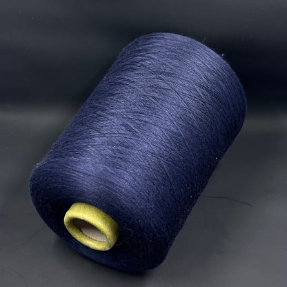 Fiber: 100% silk yarn. Italian yarn for hand and machine knitting. Country: Italy. Color: midnight blue. Silk yarn is a luxurious and versatile material. This silk yarn is ideal for machine knitting. Packing the yarn on a cone ensures that the silk yarn stays organized and tangle-free, allowing you to knit evenly and without interruptions.