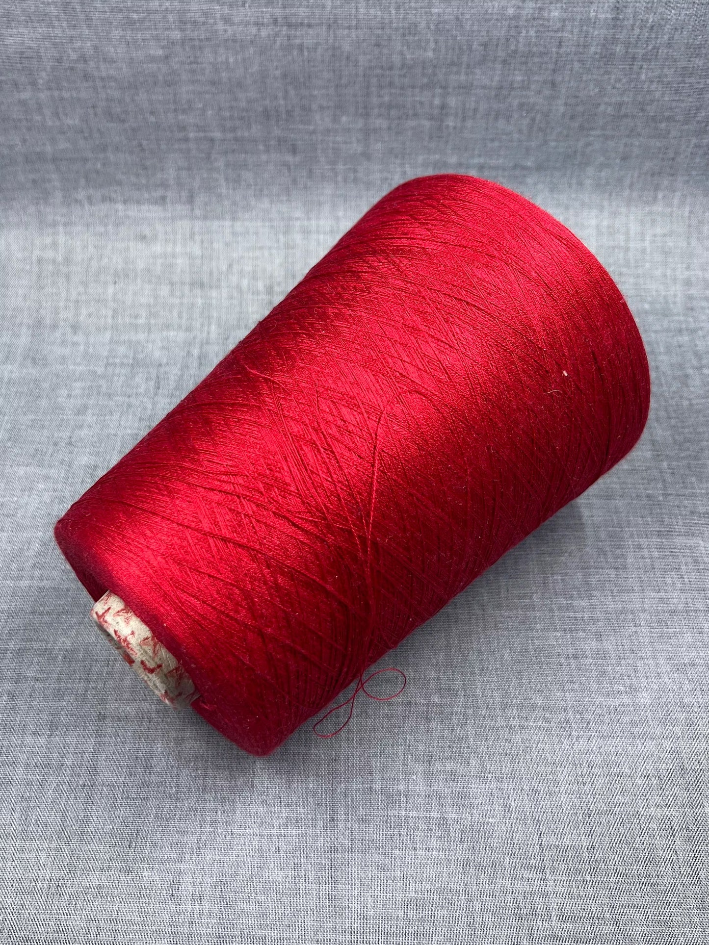 Silk Yarn 100%. Italian Silk Yarn for Hand & Machine Knitting.  Reference: Botto Giuseppe, Schappe NM 2/120 Fibre: 100% Silk Yarn. Yarn Color: Red. The yarn will be perfect for weaving and knitting.