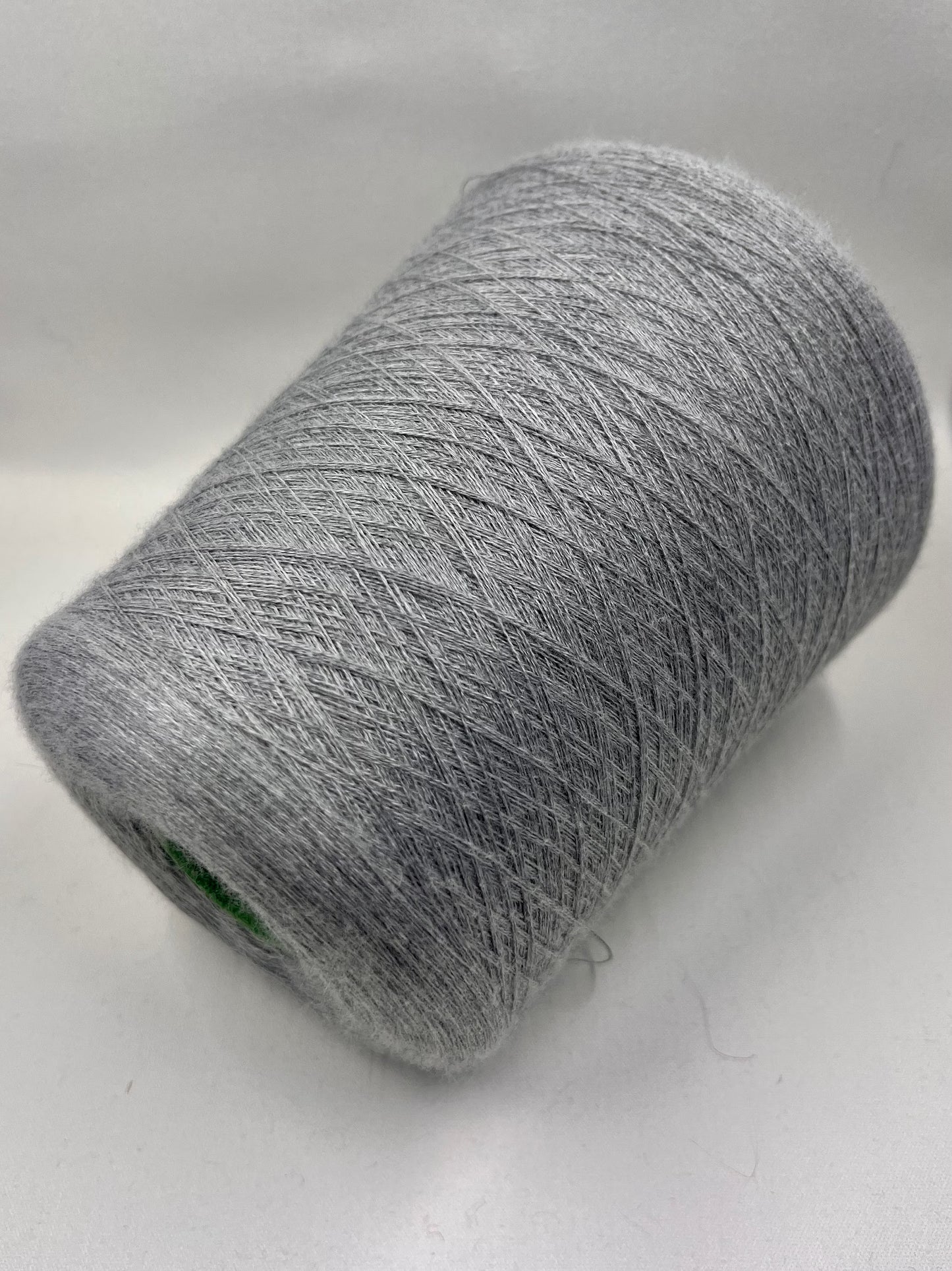 Cashmere blend Yarn by Botto Poala. Cashmere Yarn & Silk Yarn for Hand & Machine Knitting. Yarn on Cone. Fiber: 70% Cashmere Yarn & 30% Silk Yarn.  Reference: Botto Poala, Nm 2/48 This is a very soft pure Cashmere blend yarn by Botto Poala.