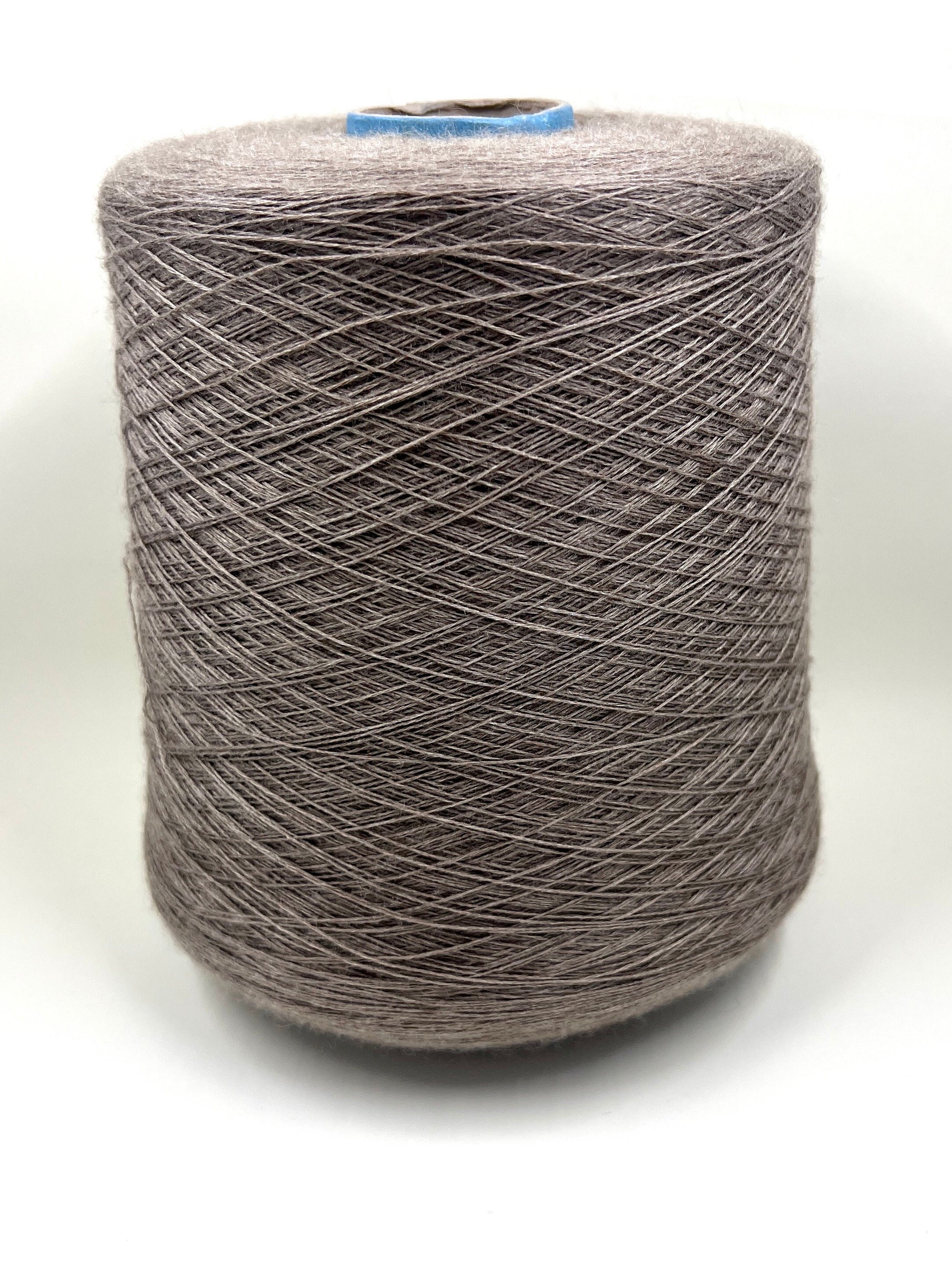 Royal Cashmere Yarn 70%, Silk Yarn 30%,Color Gray. Profilo SNC , Yarn on Cone. Italian Lace Yarn. Hand and Machine Knitting. Fiber: Royal Cashmere Yarn 70%, Silk Yarn 30%,Nm 1/80x5 Reference: Profilo SNC for Machine knitting and Hand Knitting. 