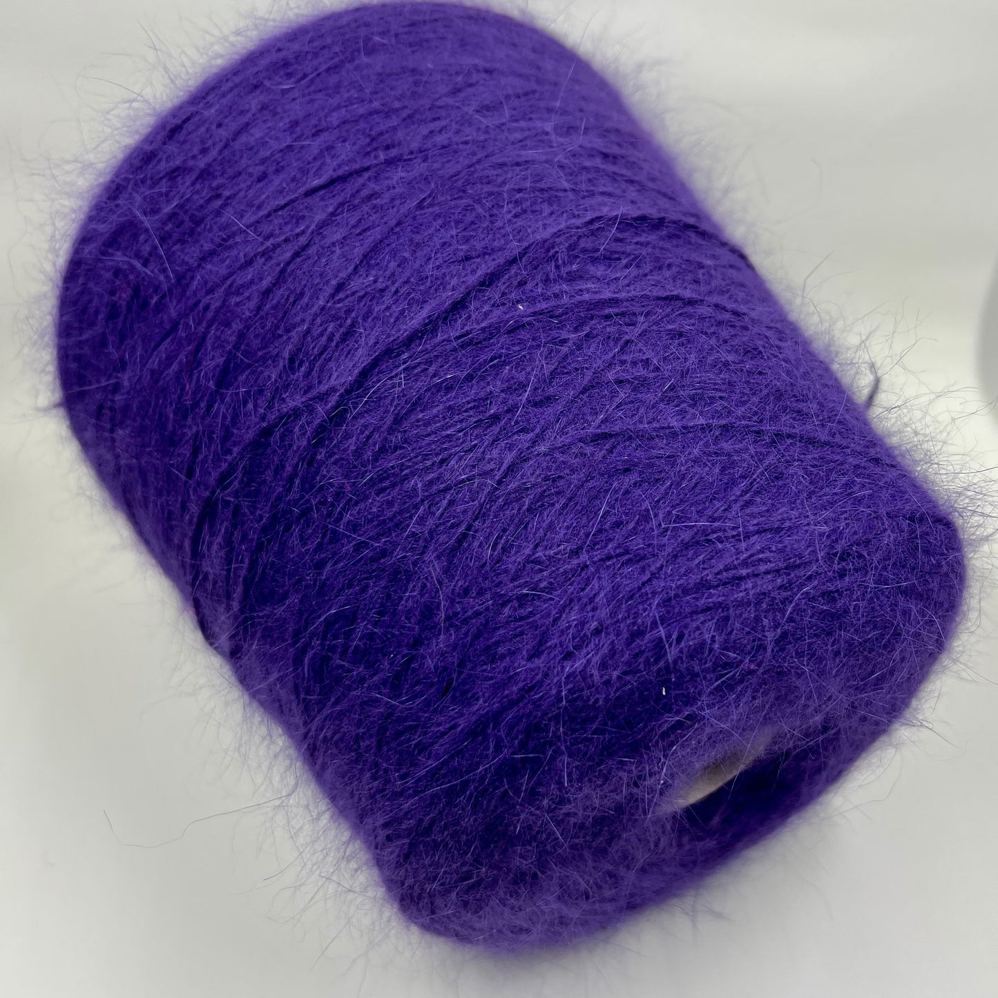 Angora blend Yarn by Profilo. Angora Yarn for Hand & Machine Knitting. Yarn on Cone. Fiber: 80% Angora Yarn & 20% Poliamide. Yarn Colour: Taupe. Reference: Profilo, Nm 2/10 This is a very soft pure Angora blend yarn by Profilo.