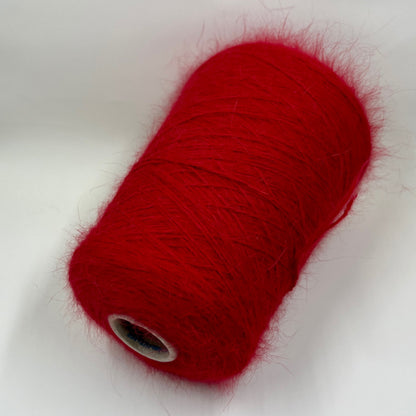 Angora blend Yarn by Profilo. Angora Yarn for Hand & Machine Knitting. Yarn on Cone. Fiber: 80% Angora Yarn & 20% Poliamide. Yarn Colour: Red. Reference: Profilo, Nm 2/10 This is a very soft pure Angora blend yarn by Profilo.