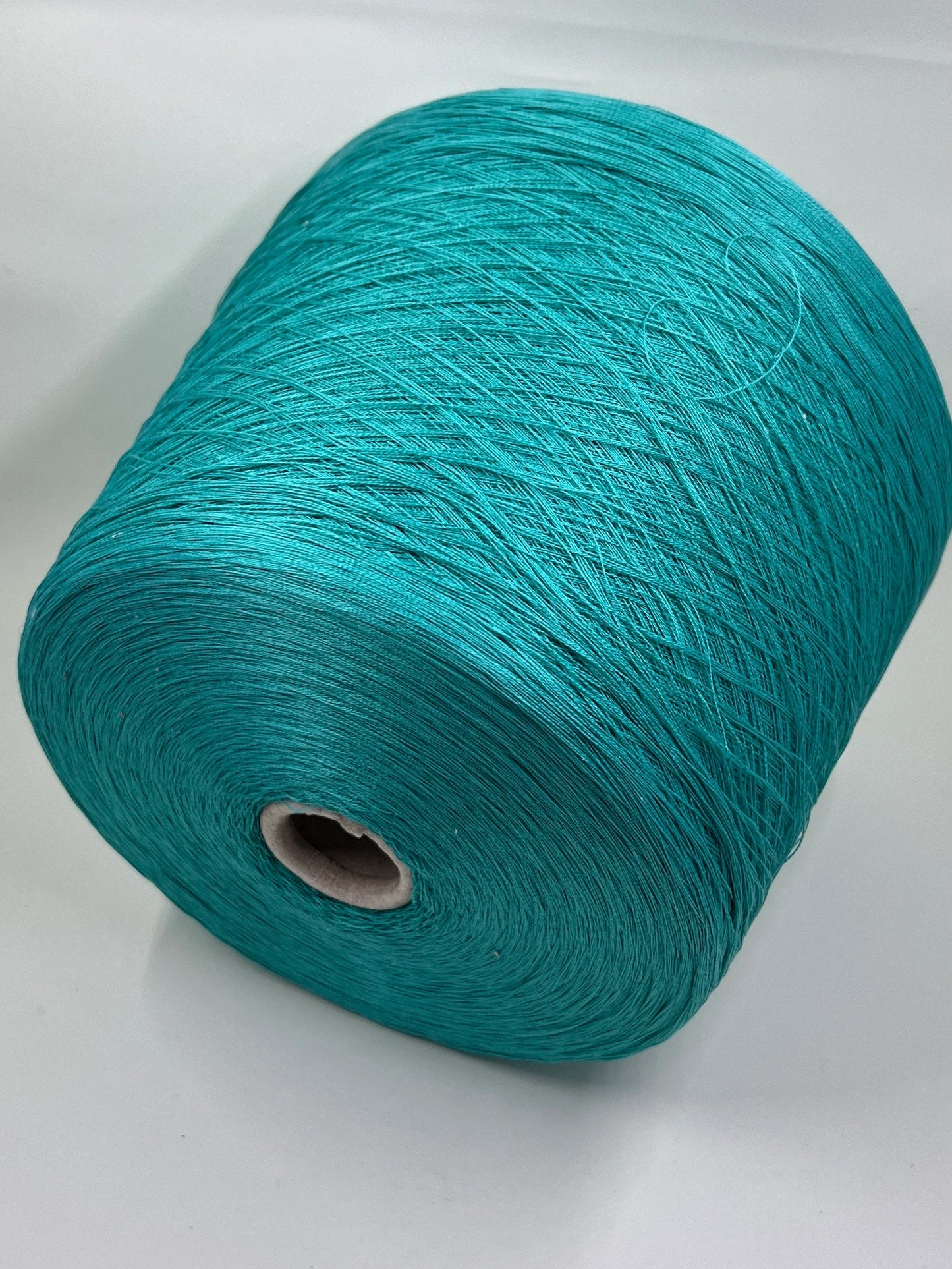 Cotton lace yarn on cone, 100% Cotton Yarn. Luxury Cotton yarn, Machine Knitting, Hand Knitting, Summer yarn. Sessia, art Flora Nm 2/50 Fiber: 100% Cotton Yarn. Yardage per 100g: 2500m per 100g / 2734 yards per 3.52oz The yarn on cone will be perfect for weaving and knitting but can also be used for crocheting.