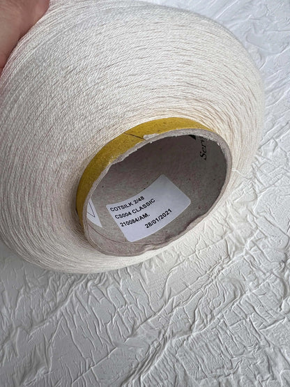 Silk Yarn 55%, Cotton Yarn 45%, Yarn on Cone. Yarn for hand&Machine knitting. Color White. Per 100 gr