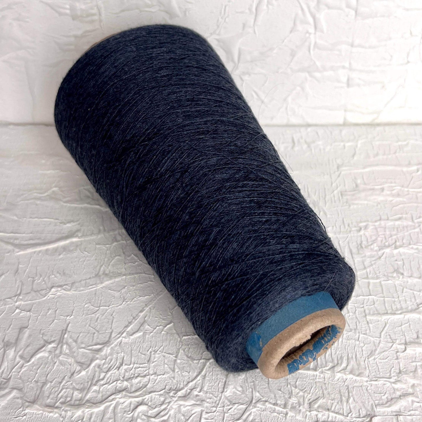 Silk Yarn 55%, Cotton Yarn 45%,Yarn on Cone. Zegna Baruffa. Color Blue jeans. Per 100 gr