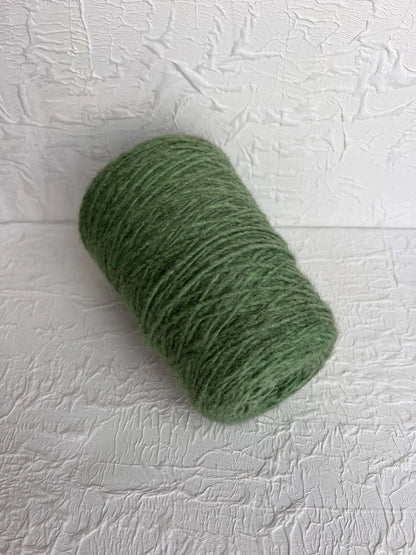 Bunny. Wool Yarn  50%, Baby Alpaca Yarn 25%, PA 25%. Color Green. Per 100 gr