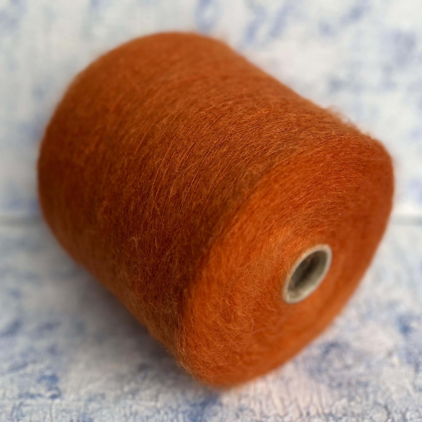 Super KidMohair Yarn 67%, PA Yarn 30%, Merino Yarn 3%. Color Rust. Per 100 gr