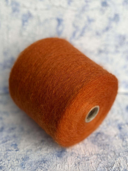 Super KidMohair Yarn 67%, PA Yarn 30%, Merino Yarn 3%. Color Rust. Per 100 gr