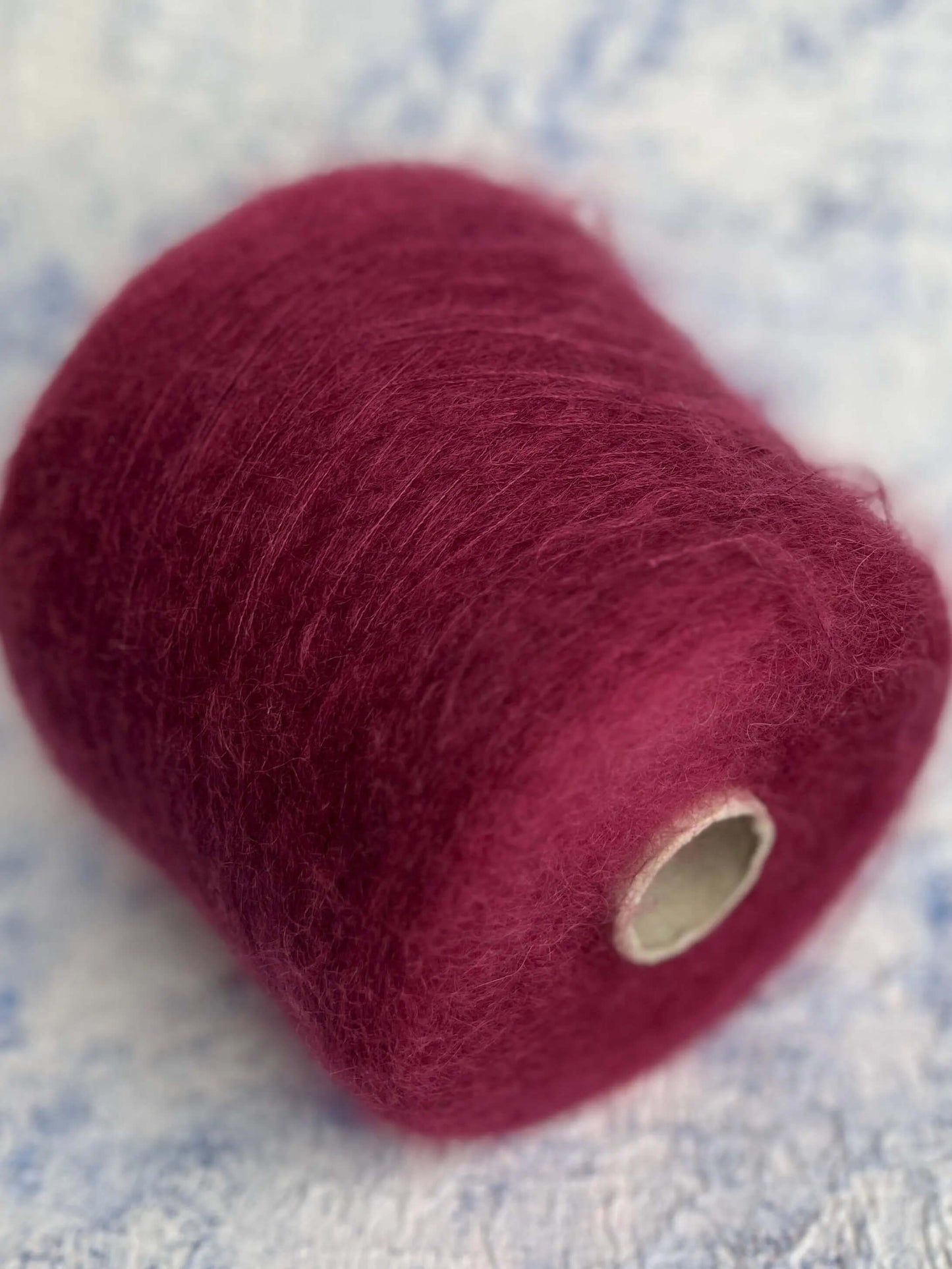 Super Kid Mohair yarn 67%, PA 30%, Merino yarn 3%. Yarn on Cone,Color Bordo. Per 100 gr