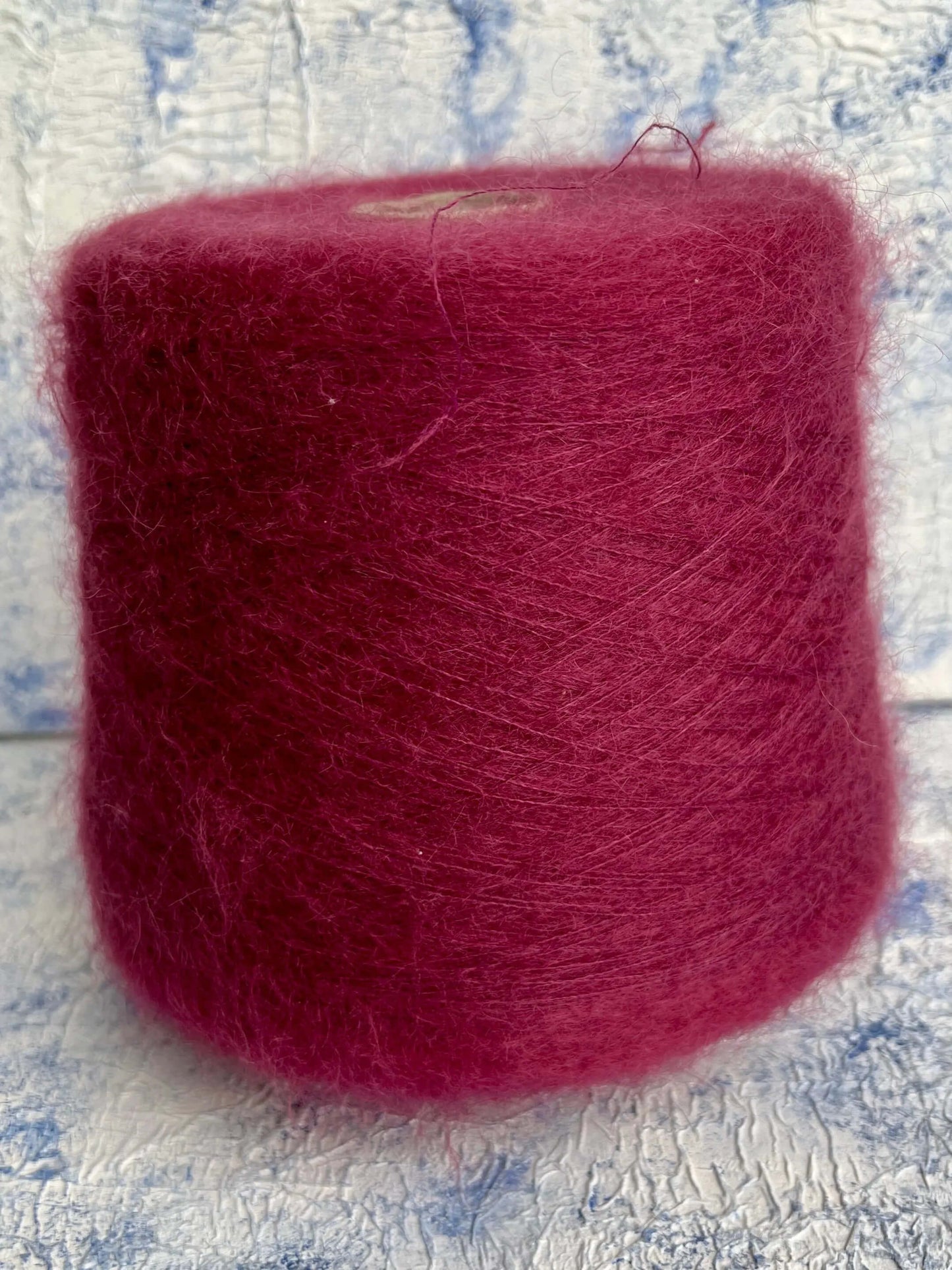 Super Kid Mohair yarn 67%, PA 30%, Merino yarn 3%. Yarn on Cone,Color Bordo. Per 100 gr