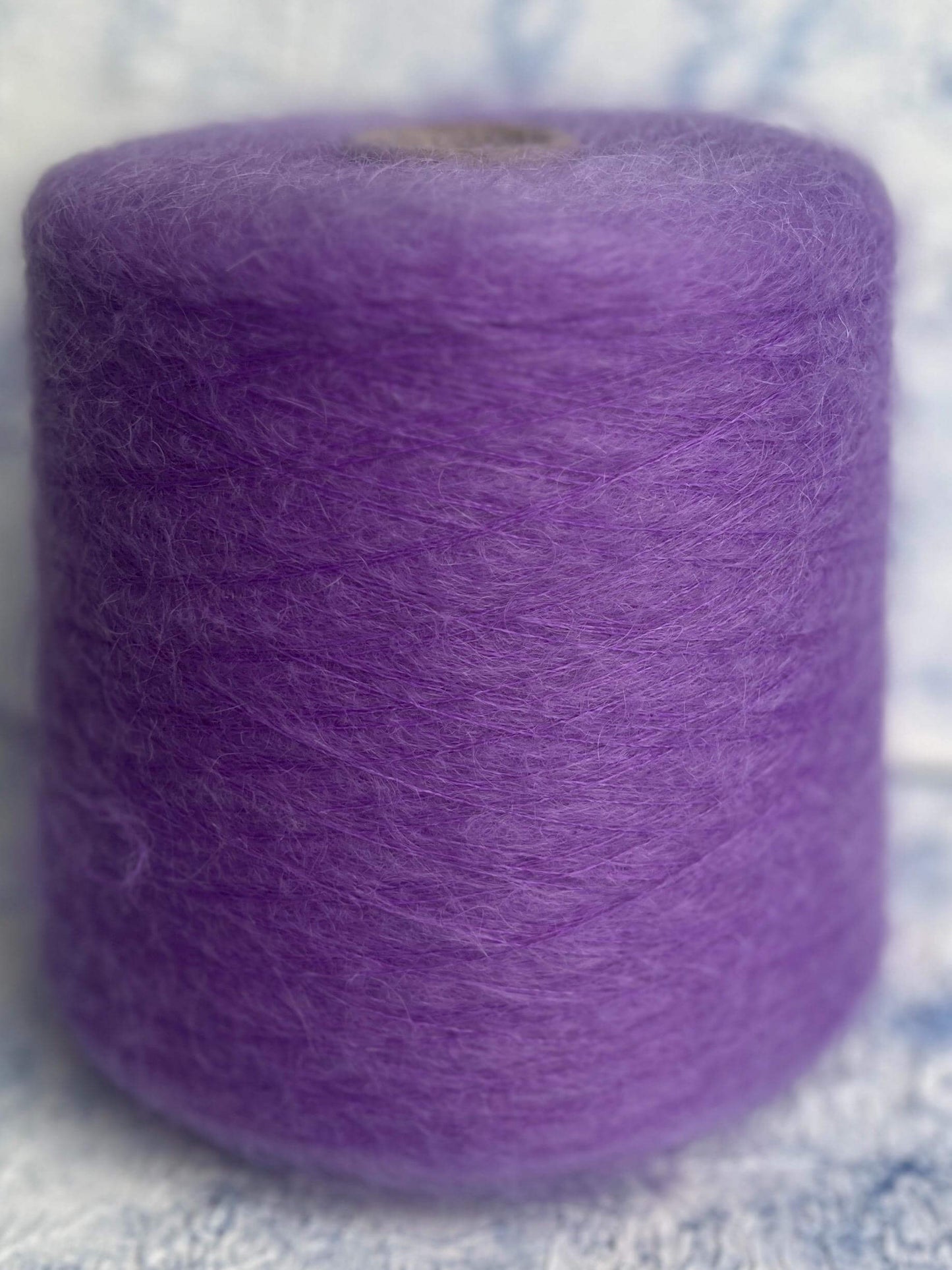 SuperKidMohair 67%, PA 30%, Merino 3%. Aurora 100 NM 10000,  Color Purple. Per 100 gr