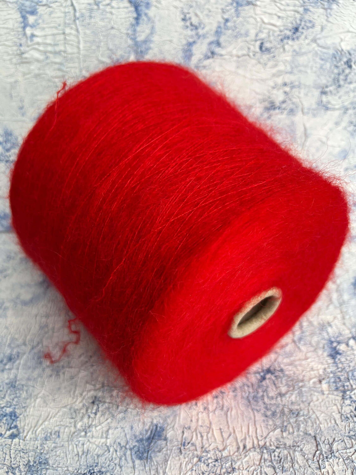 SuperKidMohair 67%, PA 30%, Merino 3%. Aurora 100 NM 10000,  Color Red. Per 100 gr