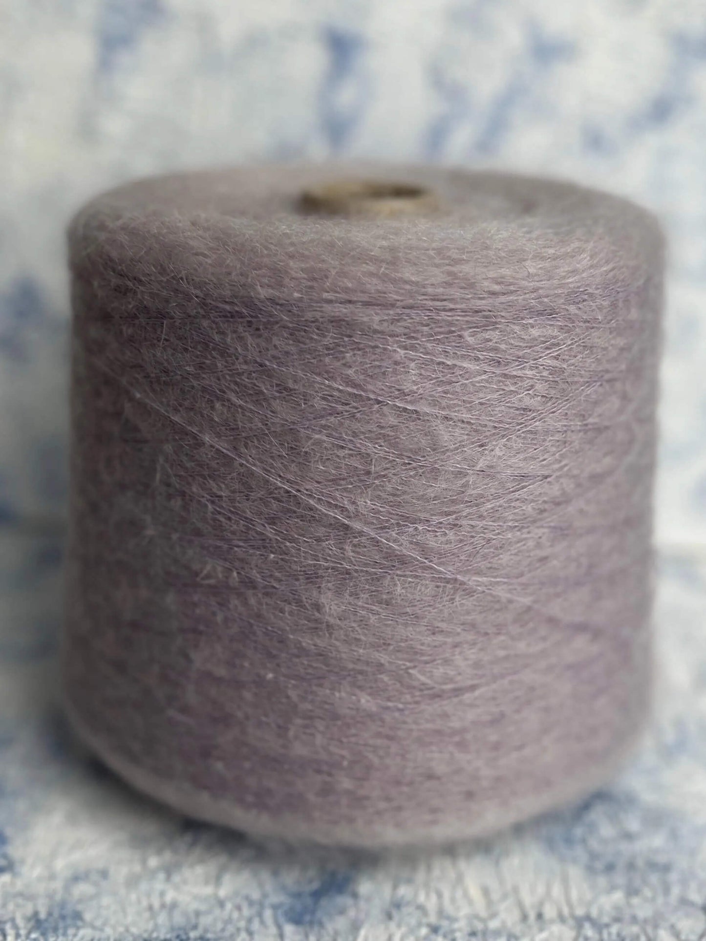 SuperKidMohair yarn 67%, PA yarn 30%, Merino Yarn 3%. Color Lavende. Per 100 gr